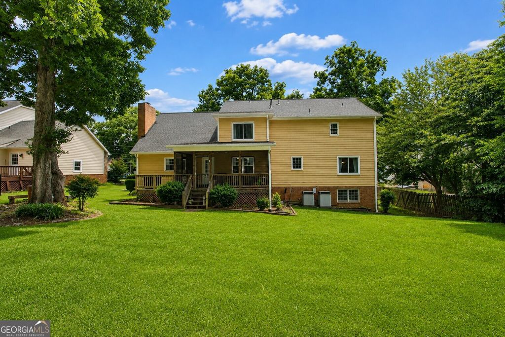 Photo of 5817 Lost Grove Drive NW, Lilburn, GA 30047 (MLS # 10794075)