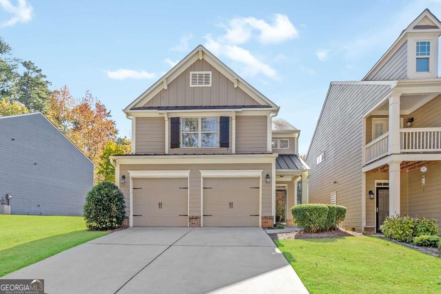 Welcome to 2377 Whispering Drive Northwest, a truly captivating residence nestled in the serene and beautifully maintained community of Whispering Lake. This elegant cluster-style home, with HOA maintained yard, offers a unique blend of tranquility and convenience, being just half a mile from the vibrant downtown Kennesaw. As you approach this home, you'll be greeted by its best-in-neighborhood lot, featuring green space on one side and unparalleled pond frontage. Step inside through a private entrance to explore the generously appointed living spaces spread across 2,160 square feet. The main level is designed for both relaxation and entertaining, featuring an open-concept layout with a view to the over-sized family room, a cozy gas log fireplace, and a chef's kitchen. This kitchen is a culinary dream with stainless steel appliances, stained cabinets, granite countertops, and an oversized island complemented by a travertine tile backsplash. The large dining room opens up to an oversized covered patio, complete with an open-air grilling space perfect for evening barbecues while overlooking the serene pond. Storage is abundant with a large pantry, walk-in utility closet, and coat closet off the oversized two-car garage, which is spacious enough to accommodate your truck. Upstairs, discover three oversized bedrooms, each with ample closet space, and two beautifully appointed bathrooms. The master suite is a true retreat, featuring a formal sitting area with views of the picturesque pond and geese, a large master bath with a separate tub/shower, his-and-hers sinks, and a proper water closet, all leading into a very large walk-in closet. The secondary bedrooms are equally spacious, ensuring comfort for everyone. Additionally, an upstairs large loft-style media room or open-concept office area offers flexible space for work or play. This home is more than just a place to live-it's a lifestyle. Enjoy the quiet, tree-lined streets and the walking trails that lead to a scenic pond, yet still be within walking distance of all the dining, shops, and events that downtown Kennesaw has to offer.