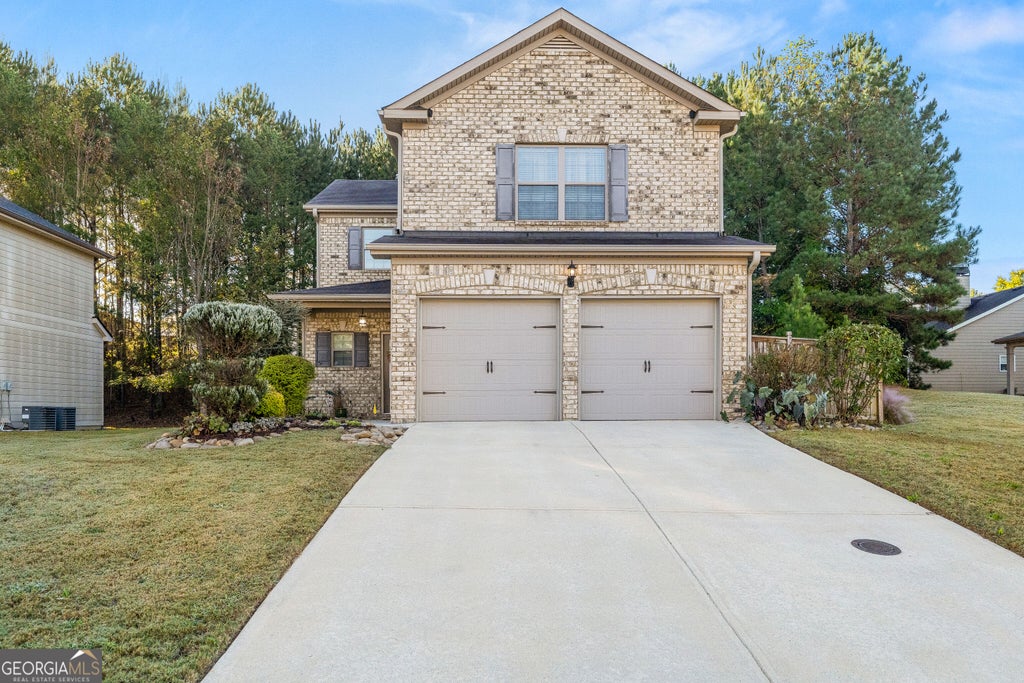 Photo of 6505 Muirfield Point, Fairburn, GA 30213 (MLS # 10878509)
