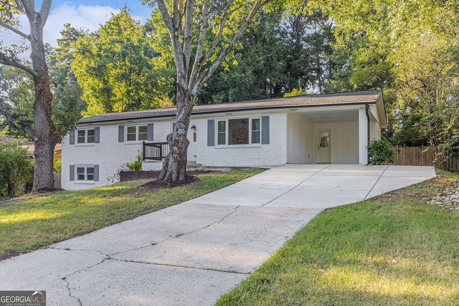 Fully renovated brick ranch on finished basement. This spacious home nestled in the heart of Norcross features 4BD/2BA, 2 additional bonus rooms and 2 family rooms in the basement. The basement has a separate entry, driveway and sidewalk, perfect for large and multi-generational families. On the main level you are greeted with brand new gorgeous LVP flooring, a modern electric fireplace and a spacious white kitchen with brand new appliances and stone countertops. Enjoy the privacy of a large fully fenced backyard and deck. This property is just minutes away from the access to I-85, Peachtree parkway shopping, and dining establishments. With the absence of HOA restrictions, you'll enjoy the freedom to personalize this residence to your liking. Don't miss this rare opportunity to own a versatile home in a prime location, it won't last long!