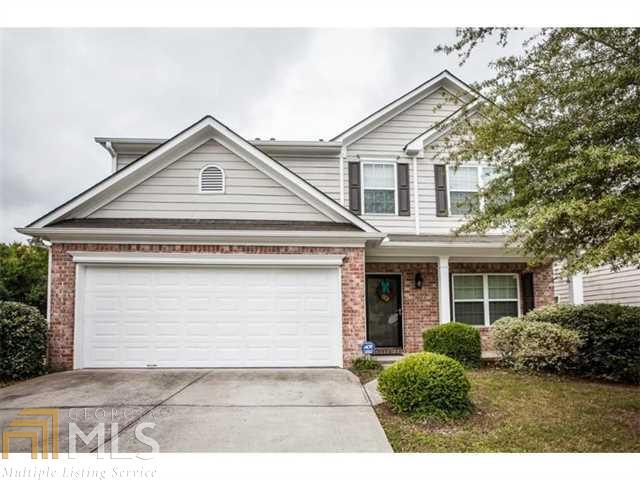 Welcome Home! Freshly painted & spotless, this MOVE-IN READY home features sought-after open floor plan! The kitchen with tile backsplash & stained cabinets is open to breakfast area & large family room with fireplace! Master suite includes large master bath with separate garden tub, dual vanities & extra large walk-in closet! Elegant wainscoting & chandelier in dining room add the finishing touches! Great location - close to shopping, Silver Comet Trail & easy access to East/West Connector, I-20 & I-285! Hurry, this will go fast!!