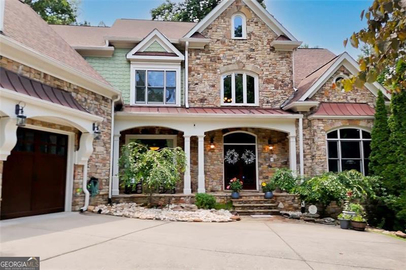 Exquisite Private Retreat on 7 Acres: Your Dream Home Awaits! Discover the epitome of luxury living in this stunning 7,149 sq ft estate, featuring 4 spacious bedrooms and 4.5 elegant bathrooms. This exceptional home offers a master suite conveniently located on the main level, while the upstairs boasts three additional bedrooms, including one with an attached bathroom and two sharing a thoughtful Jack and Jill layout. Step outside to your private oasis, complete with a saltwater, propane-heated pool and a relaxing hot tub. Enjoy the serenity of nature with a beautifully designed koi pond and a tranquil natural pond. The property is securely gated for ultimate privacy and peace of mind. The finished basement is an entertainer's dream, featuring a custom-built bar, a weight room complete with an attached bathroom, and a sauna for your personal wellness retreat. Approximately one acre of the grounds is fenced with sturdy 6x6 posts, providing plenty of space for activities, and several gates ensure easy access for trailers. Cozy up by one of the four fireplaces throughout the home, perfect for chilly evenings. Numerous upgrades during the seller's ownership include a new roof, four A/C units, new carpet, vibrant landscaping, fresh paint, new cabinets, a lake drain, and the removal of 48 trees-ensuring the property is in pristine condition and ready for you to enjoy. Don't miss your chance to own this remarkable property that seamlessly blends luxury, functionality, and tranquility. Schedule a tour today and experience the beauty for yourself!