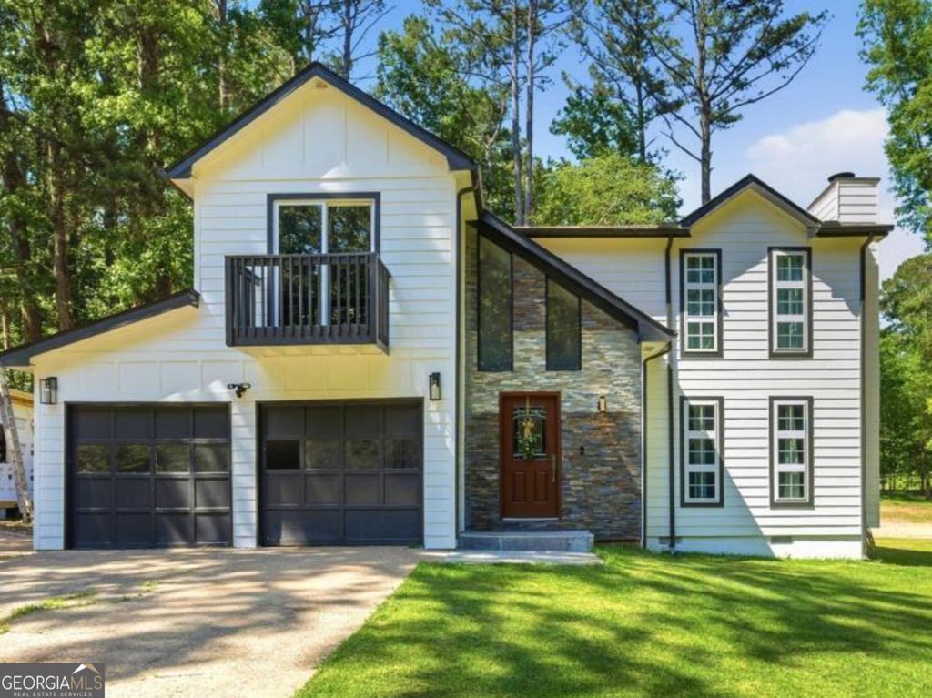 Photo of 200 Huntcliff Court, Fayetteville, GA 30214 (MLS # 10766308)