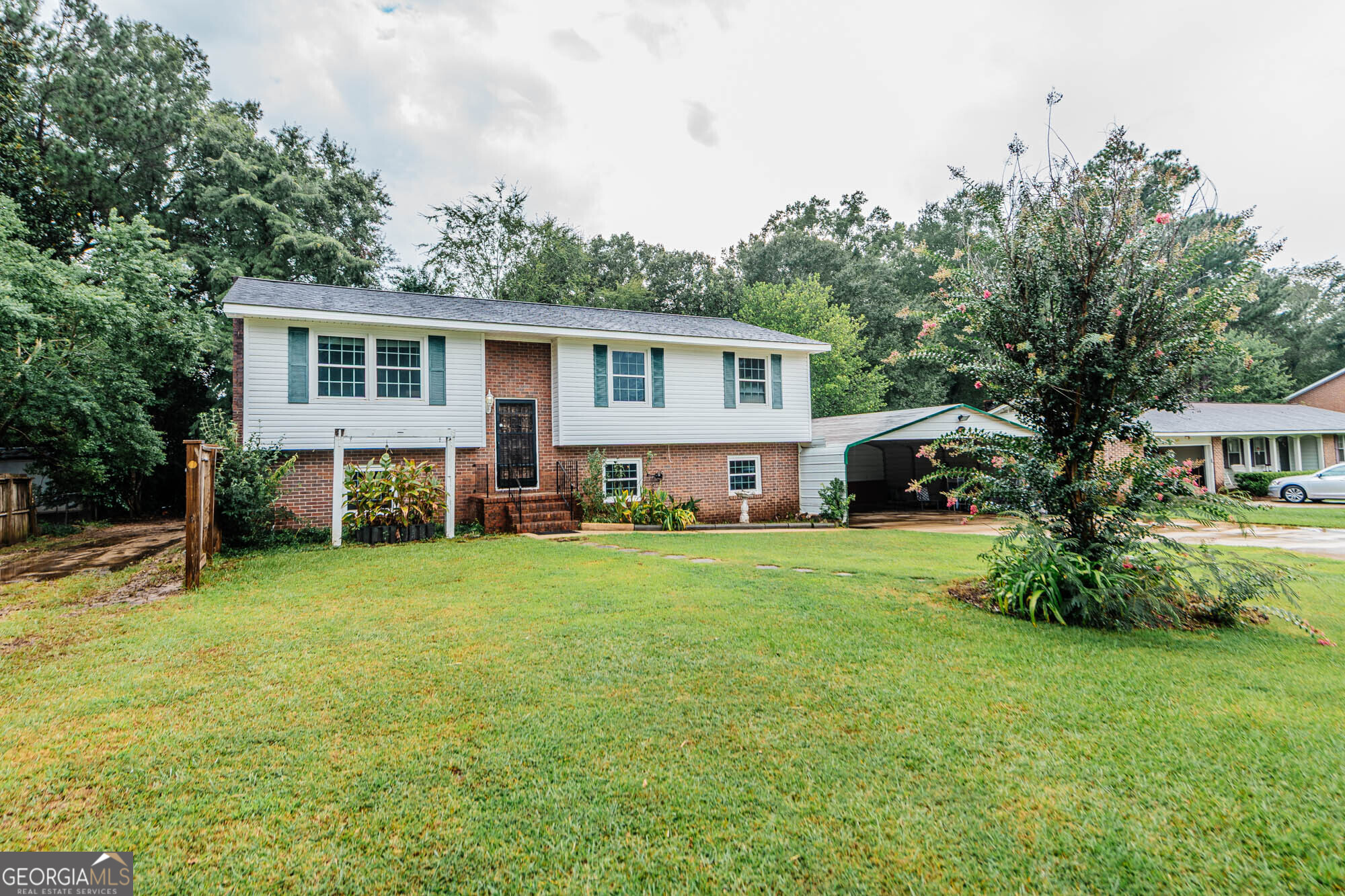 Welcome to 1404 Cambridge Road-a beautifully updated home nestled in a quiet Perry neighborhood with access to a community pool through optional membership. This move-in ready gem features a remodeled kitchen and primary bathroom, offering modern finishes and thoughtful design throughout. The HVAC system is just 7 years old, ensuring comfort and efficiency, while updated flooring adds warmth and style to every room. Enjoy peace of mind with updated windows and the convenience of a washer and dryer that stay with the home. With plenty of parking and a spacious layout, this property is perfect for both relaxing and entertaining. Don't miss your chance to own a home that blends charm, comfort, and practicality in one inviting package.