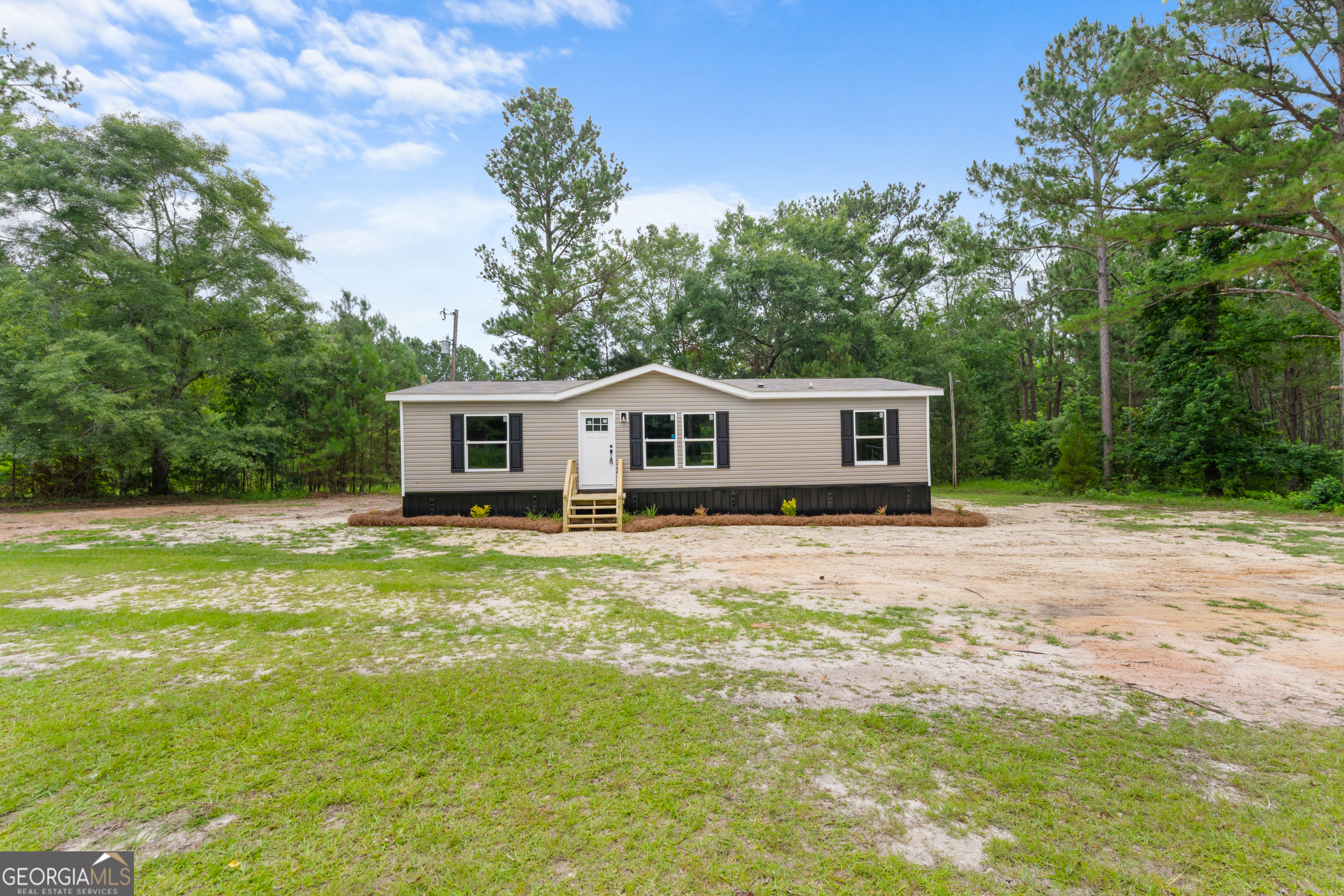 Charming 3 bed, 2 bath home on just under 3 acres! This brand new home features an open-concept layout, stainless steel appliances, and sleek modern finishes throughout. Enjoy the privacy with your very own fish-stocked pond right on the property. Set on a permanent foundation, allowing for all financing types. A rare chance to own a move-in ready home with acreage on Rosemary Church Road, call today to schedule your tour!