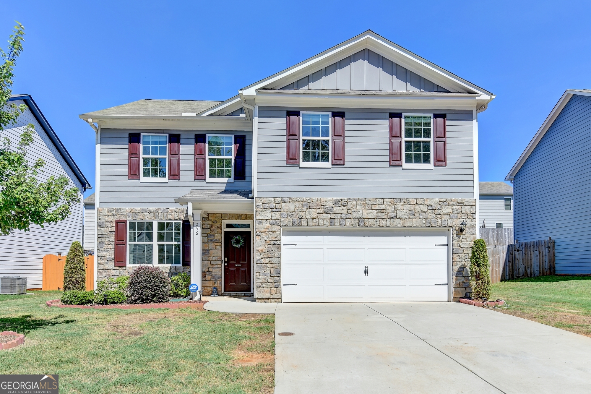 Welcome to 256 Starbucks Parkway- a beautifully maintained home in the heart of downtown Pendergrass! This 4-bedroom, 2.5-bath home is located in a new community with a pool, offering both comfort and convenience. Nestled between Athens and Gainesville, with quick access to I-85 and Hwy 129, this location is ideal for commuters and families alike. Step inside to a welcoming entry foyer that opens to a spacious, open-concept layout connecting the great room and kitchen-perfect for entertaining or relaxing with family. The eat-in kitchen features white cabinetry, granite countertops, stainless steel appliances, and a large island ideal for meal prep or casual dining. Upstairs, you'll find four generous bedrooms and two full baths, providing ample space for everyone. Enjoy outdoor living in the private fenced backyard, complete with a deck, mature pomegranate and apple trees. Fresh improvements just completed with beautiful new grass in the front yard, and fresh pine straw in the backyard- adding curd appeal and providing clean, well-maintained outdoor space. Don't miss this move-in ready gem in one of Pendergrass most desirable and growing neighborhoods!