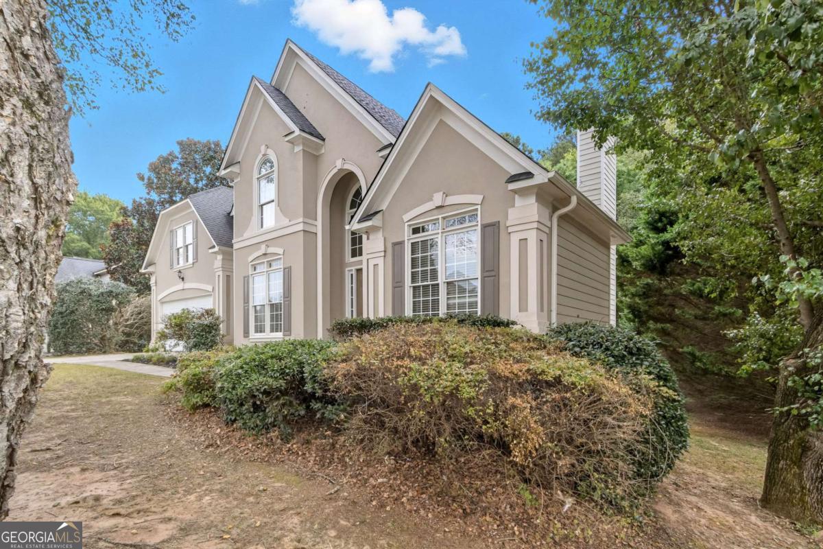 Nestled in a quiet Foxhall community, this home offers incredible potential for its next owner. With a generous layout and private yard, it provides the perfect canvas to update, expand, or personalize to your taste. Whether you envision modern renovations, creating outdoor living spaces, or simply adding your own finishing touches, this property allows you to transform it into your dream home. Conveniently located near top Cherokee County schools, shopping, dining, and major highways, this home combines a sought-after location with endless opportunity.