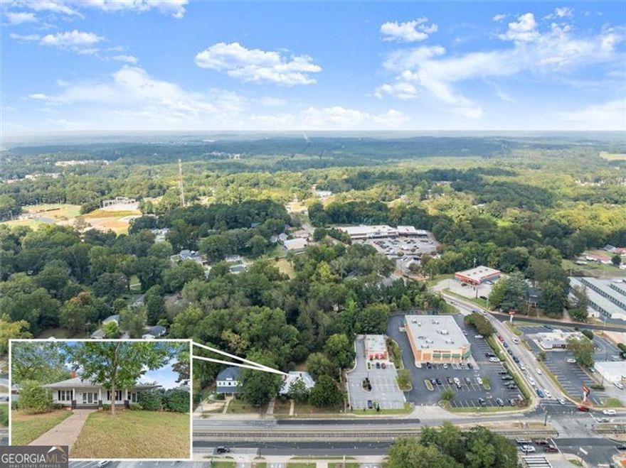 Price Improvement! Now Offered at $450,000 OCR Zoning | High-Traffic Corridor | Prime Visibility  Now available in the heart of Commerce! This OCR-zoned property sits directly on N Broad St/US-441, one of the city's busiest corridors with excellent daily traffic counts and immediate access to I-85 (Exit 147). Offering road frontage and strong visibility, this site provides unmatched flexibility for office, commercial, residential, or mixed-use development.  Surrounded by established retailers including Walgreens, Domino's, CVS, Hardee's, Regions Bank, and multiple fuel stations, and only minutes from Tanger Outlets and Banks Crossing, this location benefits from consistent consumer traffic and steady regional growth.  Ideal for investors, developers, or owner-users looking to capitalize on Commerce's expanding market and own a prime, versatile property at an attractive new price.