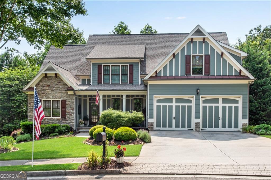 Quality was not wasted here, crown moldings, built ins and a Chef's Kitchen!! Welcome to this beautiful 4-bedroom home with Master on the Main! Located in the highly desirable Great Sky community in Canton, perfectly situated on a private cut de sac lot. This serene setting offers the ultimate combination of privacy, natural beauty, and modern living. Step inside to discover an open and spacious floor plan featuring a chef's kitchen with high-end appliances, granite countertops, a large island, and custom cabinetry-along with a walk in pantry. The keeping room blends perfectly with the breakfast room, opening to the deck and the screened porch. Perfect for entertaining and everyday living. The main level includes a light-filled living area, elegant dining space, and a cozy fireplace. Upstairs, you'll find three additional generously sized bedrooms, plus a versatile loft area ideal for a media room, playroom, or home office. Enjoy outdoor living at its finest from the stunning screened porch and deck, where you can relax or dine al fresco while taking in peaceful views of the surrounding trees. A full, unfinished basement offers unlimited potential for expansion-whether it's a home theater, gym, or guest suite. Located in a vibrant community with resort-style amenities including pools, tennis courts, walking trails, and easy access to shopping, dining, and top-rated schools, this home truly has it all. Don't miss your chance to own this rare gem in Great Sky!