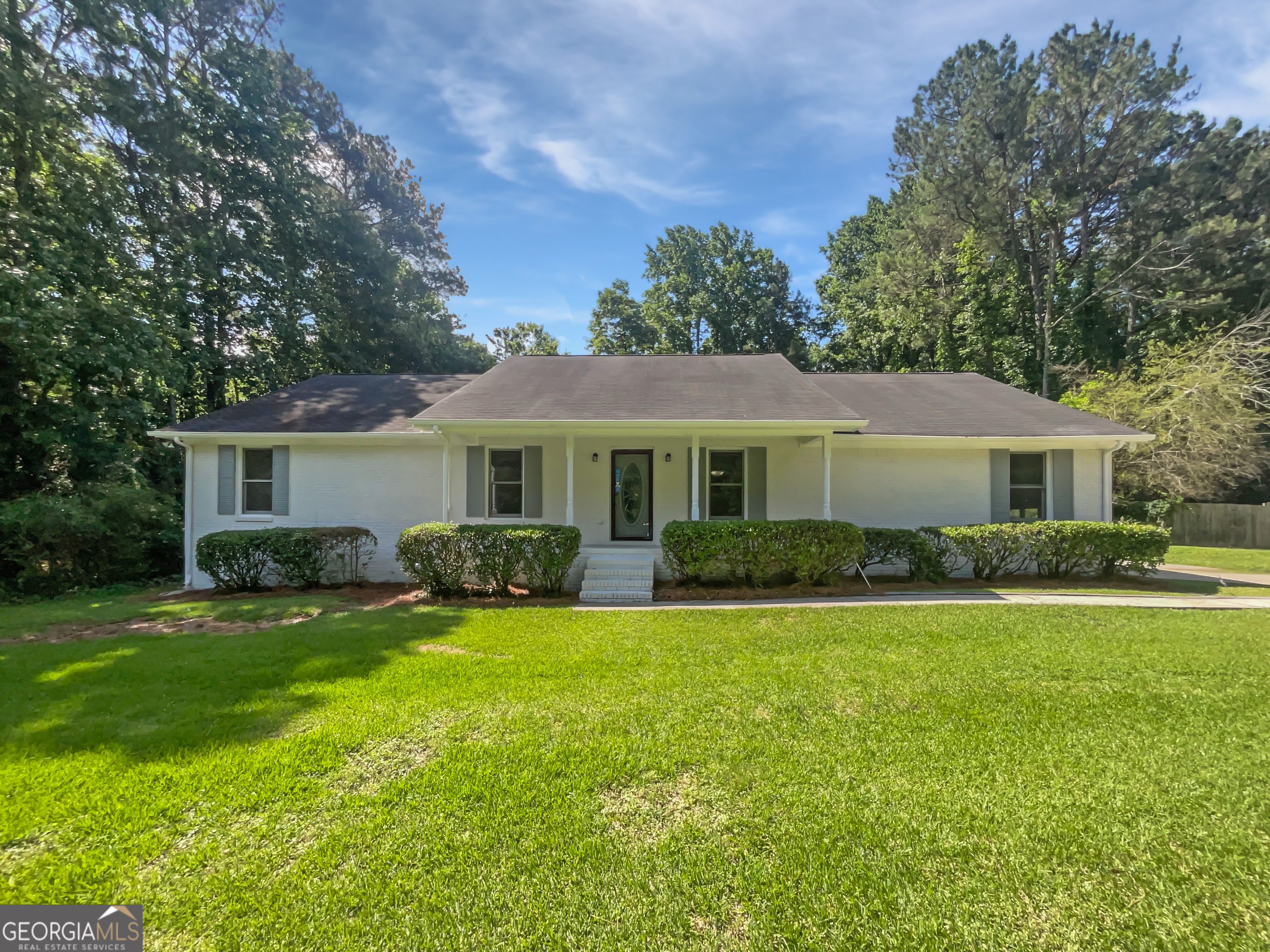Welcome home! This charming 3-bedroom, 3-bathroom Jonesboro house is ready for your personal touches! The home has fresh exterior paint, a new deck, a brand new septic system, updated flooring in many rooms, and more! The neutral color paint scheme throughout the home provides a calming and versatile backdrop for your personal style. The kitchen offers freshly-painted cabinets, granite counters, and a stylish tile backsplash. Outdoor living is a delight with covered deck for entertaining or relaxing, and a fenced-in backyard for privacy. This property is a perfect blend of comfort and style, waiting for you to make it your own!. Included 100-Day Home Warranty with buyer activation