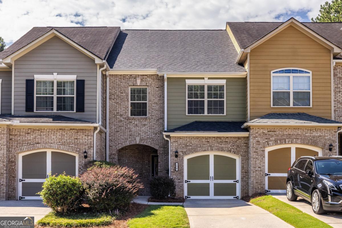 Take a look at this well-maintained, move-in-ready townhome located within 2 miles of shopping, restaurants, and entertainment. Upon entering the main level, you will find a half bath and a large storage closet, a large open concept living space with a fireplace, a built-in entertainment center with bookshelves, a kitchen with granite countertops, and stainless steel appliances. Upstairs, you will find a large bonus area with plenty of room to use as an office, a secondary bedroom and full secondary bathroom, a centrally located laundry closet, and the large primary suite. This home features an adorable fenced-in backyard/patio, offering some privacy since no other homes back up to the yard. The house has a new roof and fresh exterior paint. The HVAC was replaced in 2019. You don't want to miss this one.