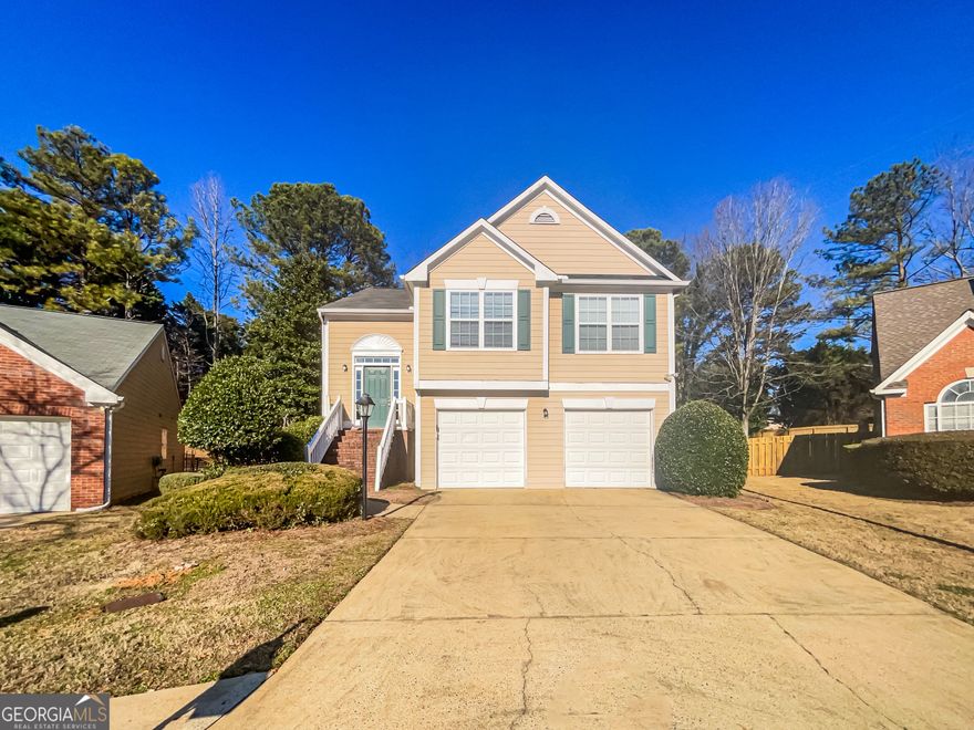 Welcome to this charming home with a cozy fireplace, complemented by a soothing natural color palette. Offering versatile living spaces, this property features additional rooms ideal for various uses. The primary bathroom boasts a separate tub and shower, ensuring your comfort and convenience. The double sinks provide ample space for personal care routines, while the good under sink storage keeps everything organized. Step outside to a tranquil backyard with a delightful sitting area, perfect for relaxation and enjoyment. Don't miss the opportunity to make this house your home.