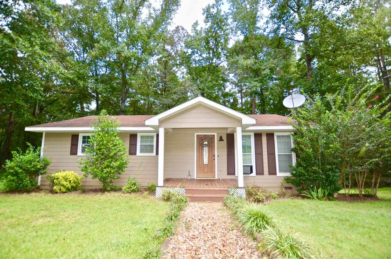 Beautiful home looking for a new owner. Beautiful new custom kitchen and BRAND NEW HVAC! USDA eligible to qualified buyers. Features include concrete hardy board siding, laminate flooring, granite counter tops, soft shut kitchen cabinets, tiled bath, large master bedroom, huge back deck, barn doors, and so much more. Literally seconds from WEST POINT LAKE... Enjoy the sounds of the flowing creek in the back yard!!! Awesome covered pet pen or storage area... This is a must see... HOLLIS HAND SCHOOL DISTRICT...
