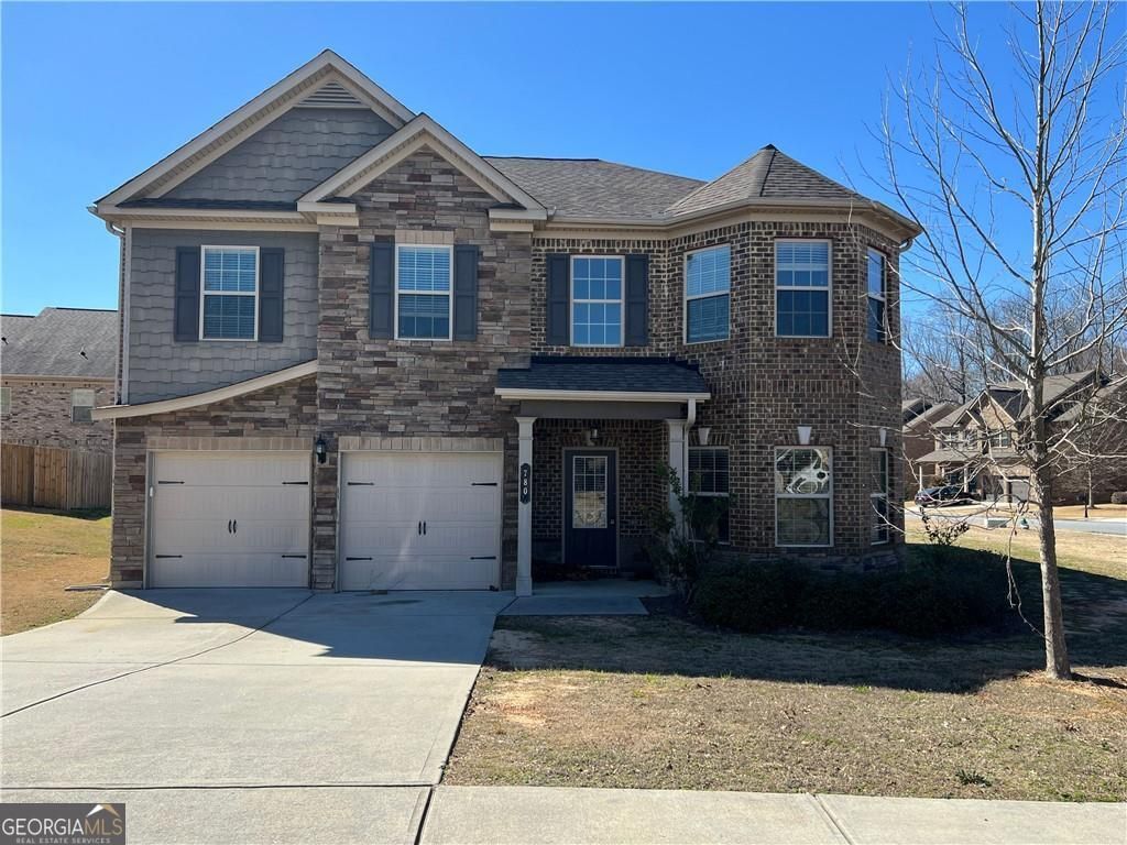 Photo of 780 Tidal Marsh Walk, Loganville, GA 30052 (MLS # 10689554)