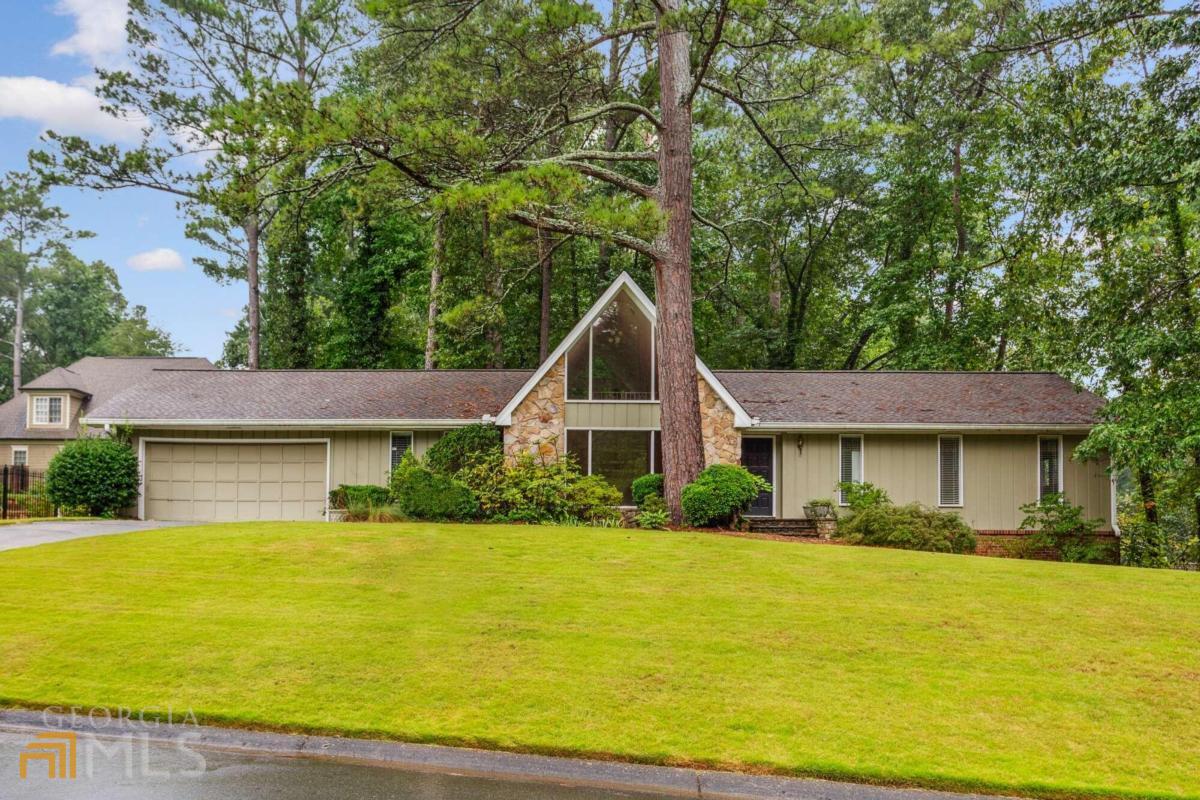 Great opportunity to be in Indian Hills Country club neighborhood and top ranked schools with East Side, Dickerson and Walton. Renovate or build your dream home. One of the best streets in the neighborhood with a double cul-de-sac.