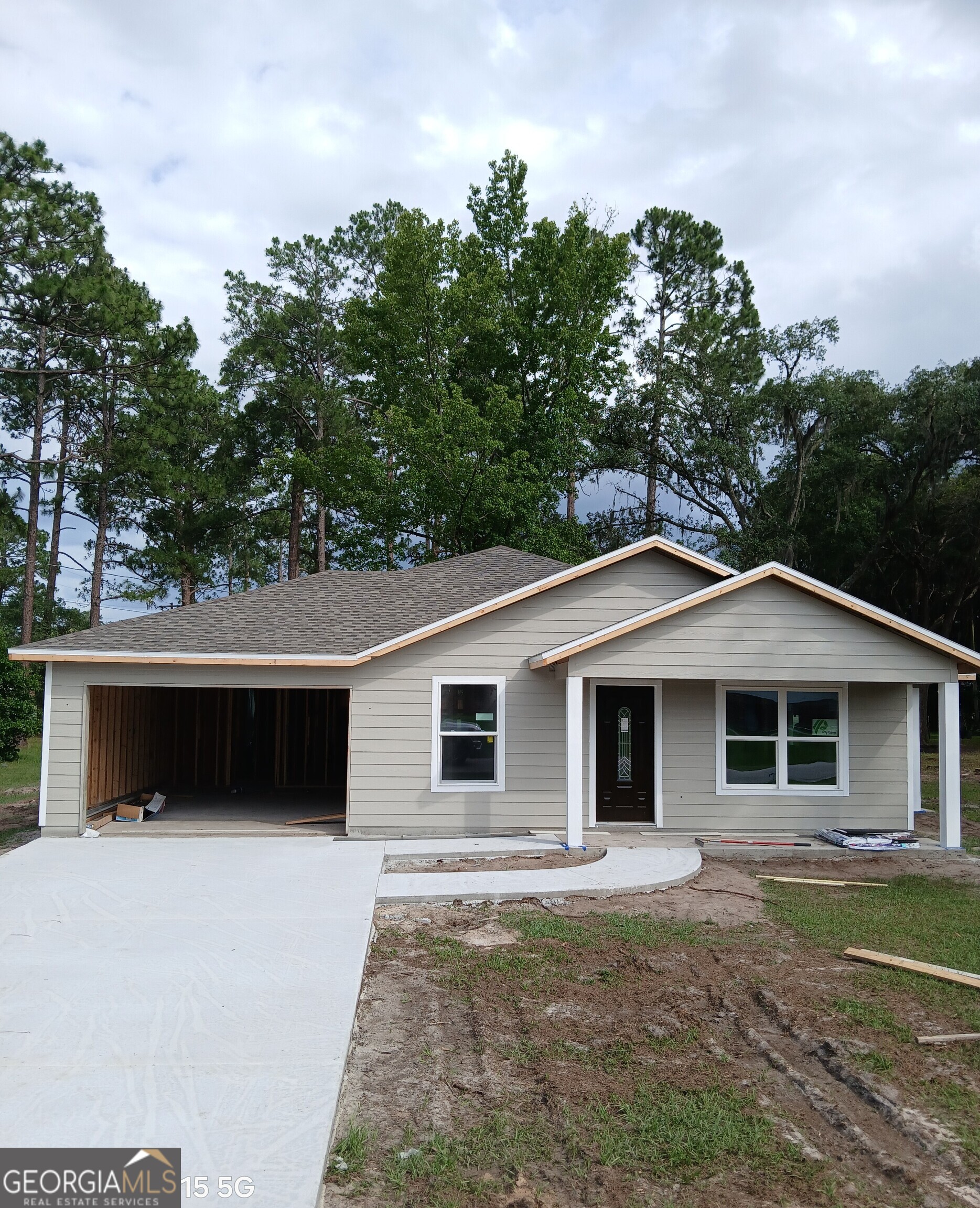 Charming New Construction Ranch-Style Home (completion date within the next 60 +or- days) 3 Beds | 2 Baths | 1,310 Sq Ft | 0.49 Acre front corner lot ... Welcome to this beautifully crafted new construction ranch-style home situated on a spacious 0.49-acre lot. Offering 3 bedrooms and 2 full bathrooms, this home features an open-concept layout designed for modern living. Enjoy cooking and entertaining in the stunning kitchen equipped with granite countertops and quality finishes throughout. The home also boasts a spacious garage, ideal for additional storage or workshop space. Perfectly blending comfort, style, and functionality, this home provides peaceful suburban living while still being close to local amenities. Don't miss your chance to make this exceptional property your own! Call today for a showing!!!