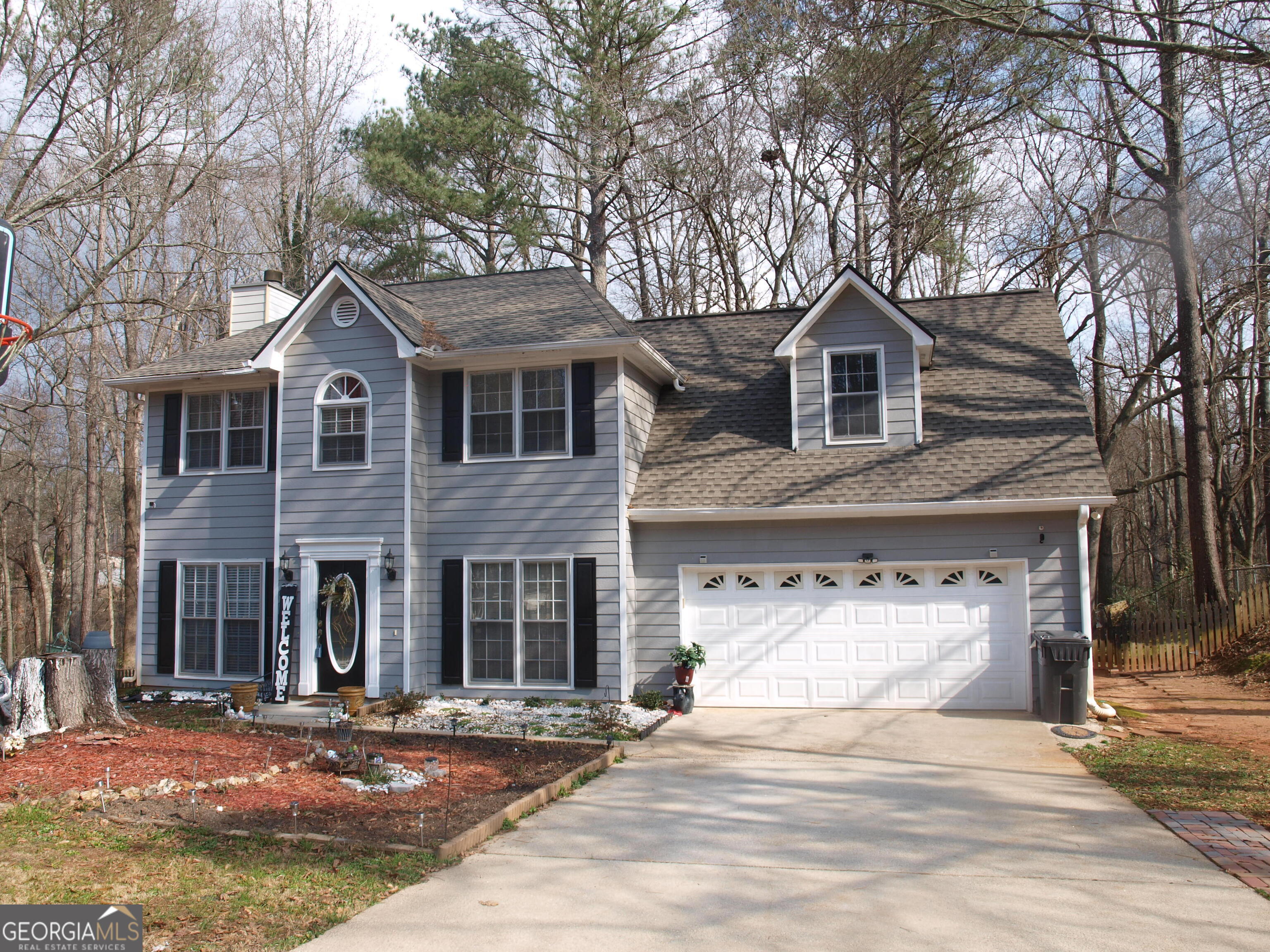 PRICED TO SELL, AWESOME home with a NEW ROOF, located in a great area of Conyers, A Safe, quiet Neighborhood and NO HOA. This is an exceptionally clean, comfortable family home near to schools, Downtown Conyers shopping area and easy driving to the Stonecrest shopping Mall, Pine Log Park, Denny Dobbs Park and Lewis Vaughn Botanical Gardens. Interior of the home has beautiful Hardwood flooring with ceramic tiles in the Kitchen area as well as cozy carpeting in some areas. Fireplace is located in the Living room for relaxing evenings and there is a 4th bedroom which can also be used as an office. The deck overlooks a fenced backyard with extra storage facility.