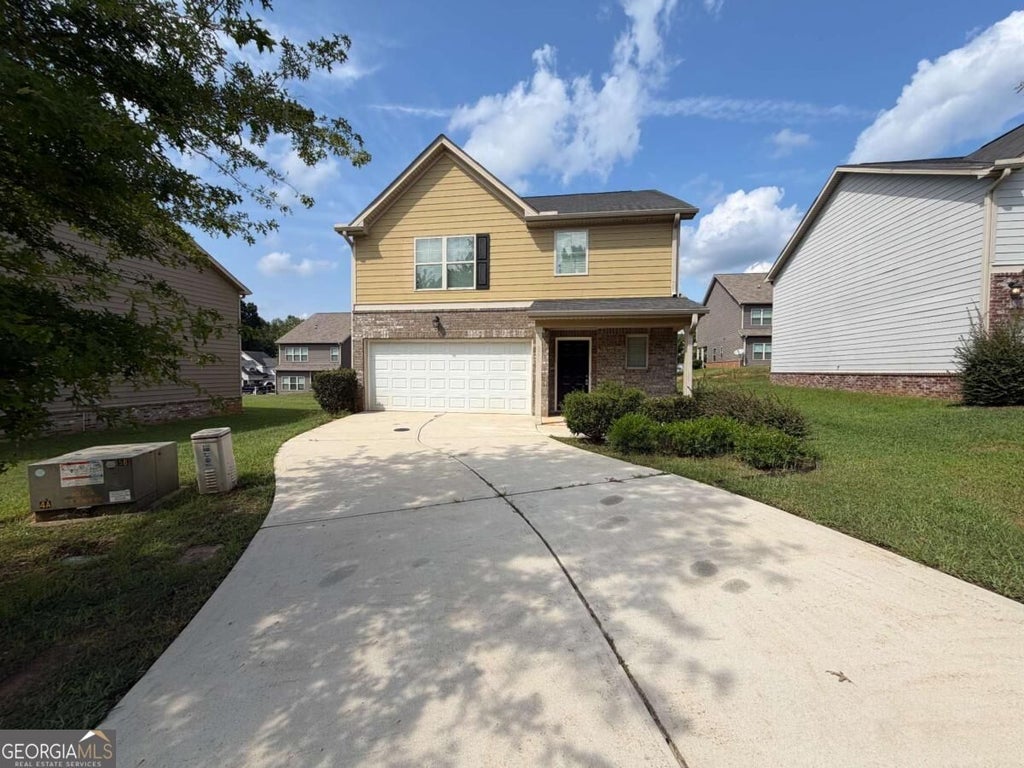 Photo of 313 Nutwood Trace, Locust Grove, GA 30248 (MLS # 10852235)