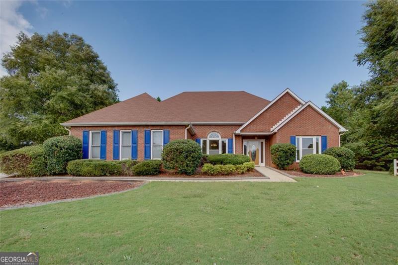 Welcome to this charming 3-bedroom, 2-bath home nestled on a spacious 3/4 acre cul-de-sac lot on the peaceful eastern edge of McDonough. Freshly updated with new floors and paint throughout, this home is move-in ready and offers the perfect blend of comfort and convenience. The bright and inviting floor plan features a cozy family room, a functional kitchen with plenty of storage, and comfortable bedrooms designed for everyday living. Step outside to the rear patio, ideal for relaxing or entertaining while enjoying the quiet, private setting. In addition to the attached 2-car garage, you'll find a large shop garage in the backyard-perfect for hobbies, storage, or extra workspace. Mature trees and a serene neighborhood setting make this property a true retreat, while still being close to McDonough's dining, shopping, and schools. Don't miss the opportunity to make this well-kept home yours!