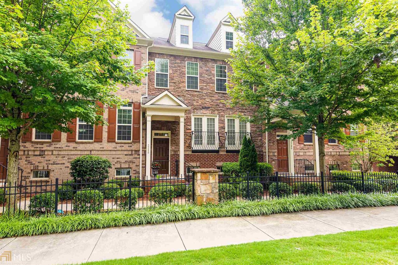 Beautiful open & bright 4 bed 3.5 bath brick townhome with so many upgrades is located in the beautiful gated Buckhead community of Ferncliff at Lenox in the Pine Hills area & just minutes to everything-shopping, restaurants, green space, walking path, and park. After entering the complex through the gated entrance arrive at this impeccably maintained townhome. From the covered front stoop, step into this beautiful home into a 2 story foyer. The spacious family room & dining room area are enhanced with a fireplace & access to an expansive deck. The gourmet kitchen which is also open to the family room offers upgraded cabinets, granite counters, stainless steel appliances, large island & breakfast area with doors leading to Juliet balconies providing an abundance of light into this home. A powder room & a large coat closet completes this level. Travel upstairs to the beautiful master bedroom with a trey ceiling & a large custom walkin closet. The luxurious master bathroom features double granite vanities, garden tub & a large separate tiled shower. 2 guest bedrooms, full bathroom & laundry room completes this level. The finished lower level offers a bedroom, full bathroom & large storage room. This level is perfect for home office, teenage or in-law suite. Additional features include hardwood flooring on main level, stairs, landing area & lower level, built-in speakers/surround sound in every room, security system, energy efficient HVAC systems, 2 car back entry garage with storage room, quality construction & located in the sought after school district of Sarah Smith Elementary, Sutton Middle & North Atlanta High School. Prime Buckhead location with easy access to shops, eateries, fine dining, entertainment, Lenox Mall & Phipps Plaza & more!