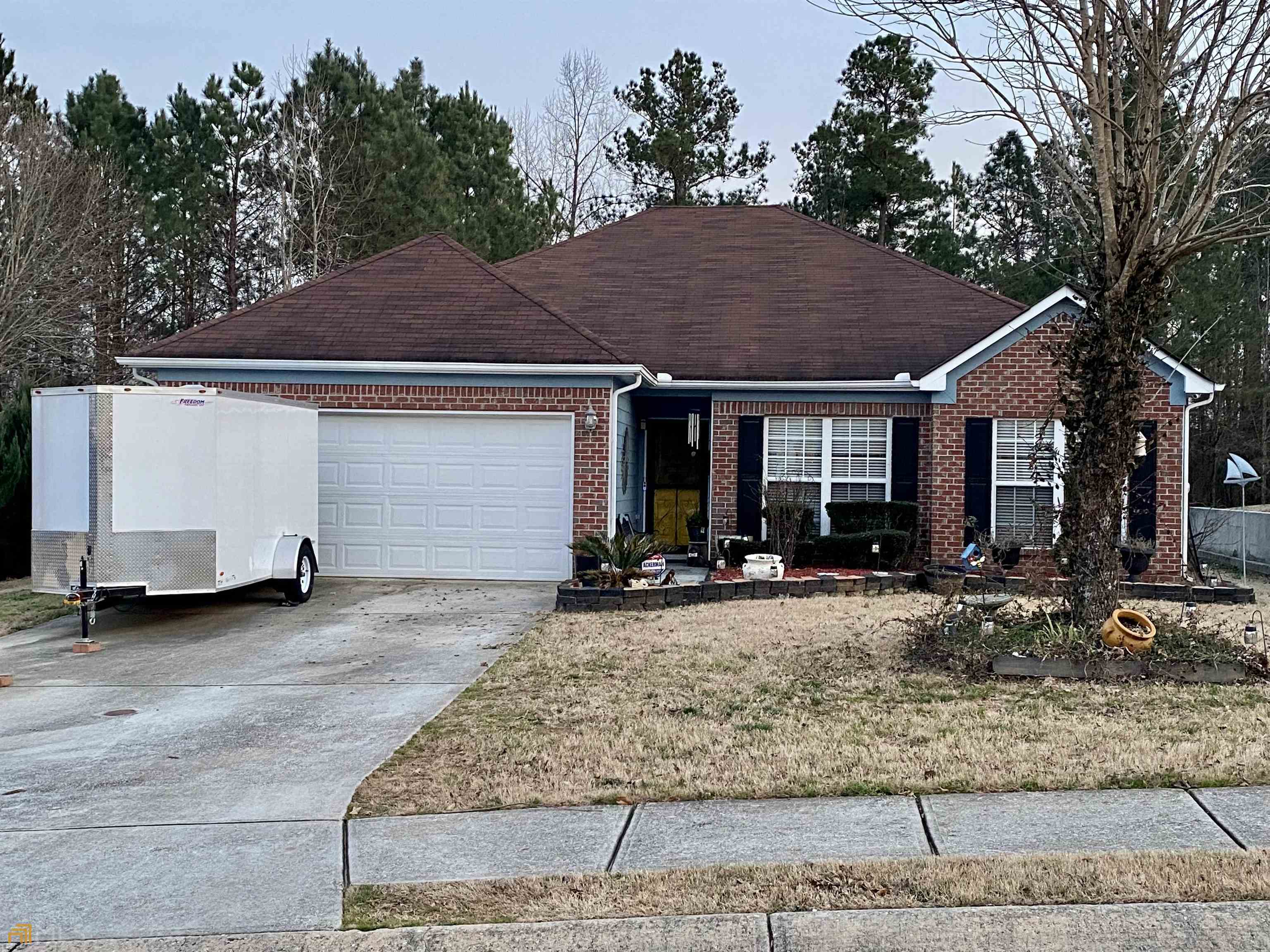 Beautiful brick-front ranch-style home, conveniently located minutes to dining & shopping as well as Hartsfield Jackson airport. Nice open floor plan for entertaining with breakfast bar, and separated living and dining spaces. Cozy fireplace in family room with grand vaulted ceilings. A great sunroom “Man Cave” for the fellas, a large back deck and storage shed for all the extras! Beautiful laminate hardwoods throughout!