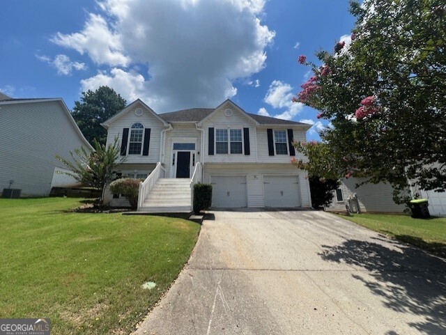 This a charming 3-bedroom, 2-bath split-foyer home in the peaceful Harbour Town community. Built in 1995, this well-maintained residence offers approximately 1,358 square feet of living space plus a partially finished basement, providing added flexibility for a home office, guest suite, or bonus room. The main level features an open living area with a cozy gas fireplace and an updated kitchen with modern appliances. A private deck overlooks the fenced backyard, creating a perfect space for relaxing or entertaining. Conveniently located near local schools, shopping, and dining, this home combines comfort, function, and location ideal for buyers seeking both space and value in a quiet neighborhood setting.