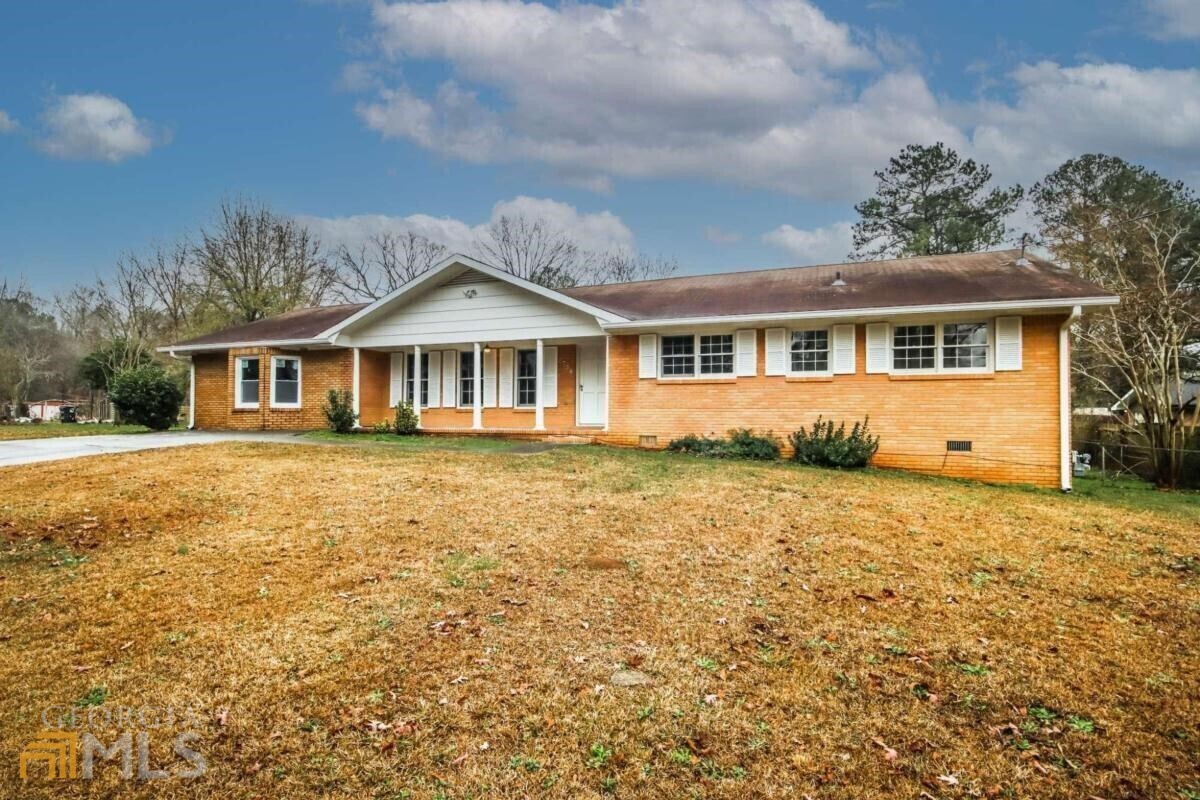 Beautiful 4 sided brick home in well-established community! Large gated level backyard for gatherings and barbeque. This bright and sunshiny home has been renovated with granite throughout, new stove, dishwasher and gorgeous plumbing fixtures. You'll love the new beautiful floors throughout and 4th room. This room has exterior access and is big enough to convert to a studio.