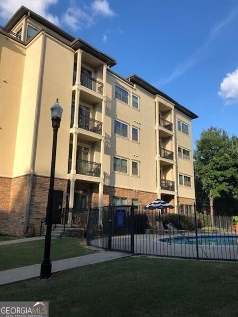 Photo of 2230 Cheshire Bridge Road #412, Atlanta, GA 30324 (MLS # 10762507)
