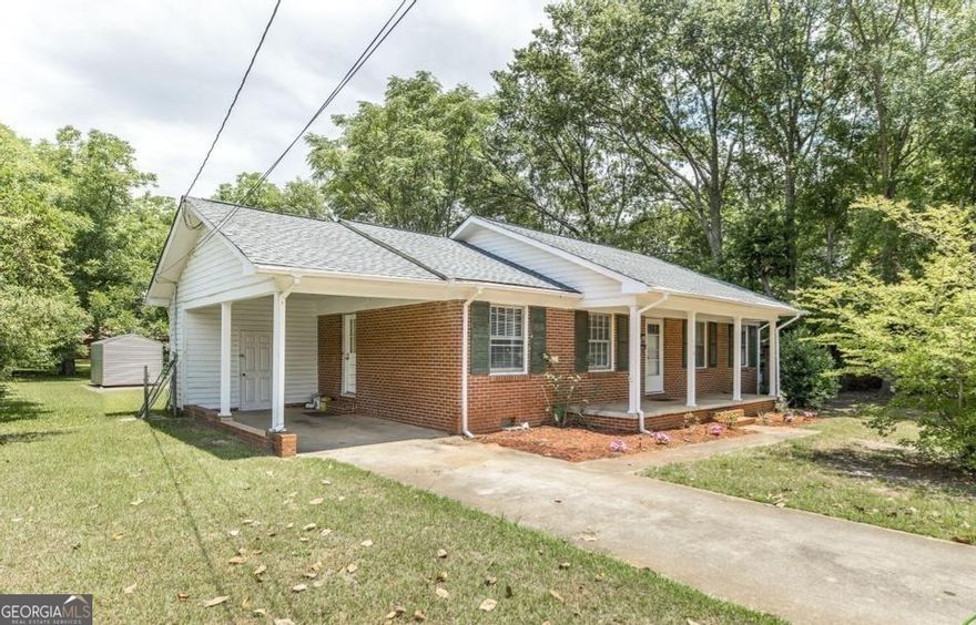 Check out this charming home! Great for adding to your investment portfolio or for first time home buyers!  Current tenants residing - $1400/month & prefers to move out with a 60 day notice.  New flooring throughout and fresh paint completed 2024.  All new plumbing - 2025.