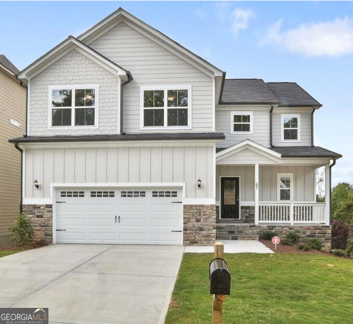Spacious 4-Bedroom Home with Finished Basement in Sought-After Northgate District! Welcome to your dream home! This beautifully maintained 4-bedroom, 2.5-bath, two-story home with a finished basement offers space, style, and function in one of the area's most desirable neighborhoods. Located just off the Millard Farmer Bypass and zoned for the award-winning Northgate High School, this property is ideal for growing families and commuters alike. Step inside to a bright, open floor plan featuring engineered hardwood flooring on the main level, a welcoming foyer, and a versatile media/flex room. The spacious living room centers around a stacked stone gas fireplace, flowing effortlessly into the dining area and modern kitchen. Enjoy cooking and entertaining with stainless steel appliances, white cabinetry, under-cabinet lighting, granite countertops, a large island with storage, and a walk-in pantry with custom shelving. Additional storage closet with built-ins and access to the rear deck and fenced backyard complete the main level. Upstairs, retreat to a large master suite with a walk-in tiled shower, glass surround, private water closet, dual raised vanities with granite, tile flooring, and a sunlit walk-in closet featuring upgraded shelving. Three additional bedrooms offer generous closet space and share a stylish hall bath with dual sinks, granite counters, and a tub/shower combo. A laundry room with tile flooring, closet, and window adds convenience to your daily routine. But the showstopper? The finished basement-a man-cave dream complete with sealed concrete floors, wooden-slat walls, corrugated metal accents, a custom-built bar, and burlap ceiling with party lighting. An additional finished room is stubbed for a bath/kitchen, offering even more potential. Large storage area and exterior door to the backyard provide both function and flexibility. Exterior features include concrete siding with stacked stone accents, a charming rocking chair front porch, oversized 20x24 garage, fresh landscaping, new interior paint, and new carpet in bedrooms, hallway, and stairs. The HOA provides weekly yard maintenance in spring/summer and bi-weekly in fall/winter, plus annual pine straw. Move-in ready and freshly pressure washed, this home is just minutes from shopping, dining, I-85, and offers a smooth commute to Atlanta Hartsfield-Jackson Airport and Downtown Atlanta. Don't miss out on this perfect blend of style, space, and location-schedule your private showing today! --
