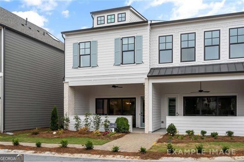End Unit, Loft Style Townhome ~ in a Gated Community! Open Concept, 3 Bed/2.5 Bath ~ Welcome to The Village at Towne Lake! No detail has been spared in this upscale townhome. With 11 ft ceilings on the main floor, 10 ft 2nd floor, and 8 Ft interior doors throughout, you will feel like you are in a loft-style apartment with plenty of light. The Family Room has a Wall of Sliding Glass Doors that open up to the HUGE front porch, which is covered, bringing the outside into the inside and vice versa. The Kitchen Features Quartz kitchen countertops w/ 42" Gray Cabinets, Breakfast Bar, SS appliances & a wonderful Skylight above the sink! EVP Flooring is throughout the main level and upstairs loft. Upstairs you will find an oversized Master Bedroom with custom closets off the gorgeous owner's bathroom suite. Down the hall, there are 2 additional bedrooms and a small loft area, perfect for an office nook. Explore this amazing community featuring a Luxurious Clubhouse, Fitness center, Swimming pool w/cabana, Pickleball, Bocce ball, Fire pit, and Dog park, all within this gated community. You are just one short mile from Historic, Downtown Woodstock, which was been rated one as one of the top entertainment districts in suburban Atlanta. If you are not familiar with Downtown Woodstock, make sure to Google it. There are many attractions for young children and many concerts and events for the entire family or great venues for dinner/date nights. Pets are accepted on a case-by-case basis. Photos are of the model home and are used for example purposes only. The actual home and colors of the home do vary, but the floorplan is the same. To top off this fantastic home, for the outdoor enthusiast, you are only 1 mile away from Rope Mill Park with miles of hiking and biking trails and a river for kayaking and fishing. Don't miss this opportunity to make this home yours today~ All APPLIANCES are included- washer and dryer too.