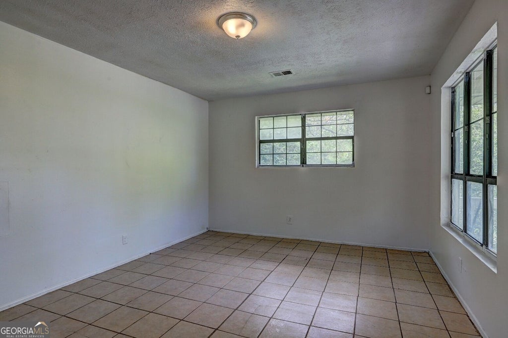 Photo of 487 Cowan Street, Macon, GA 31217 (MLS # 10850760)