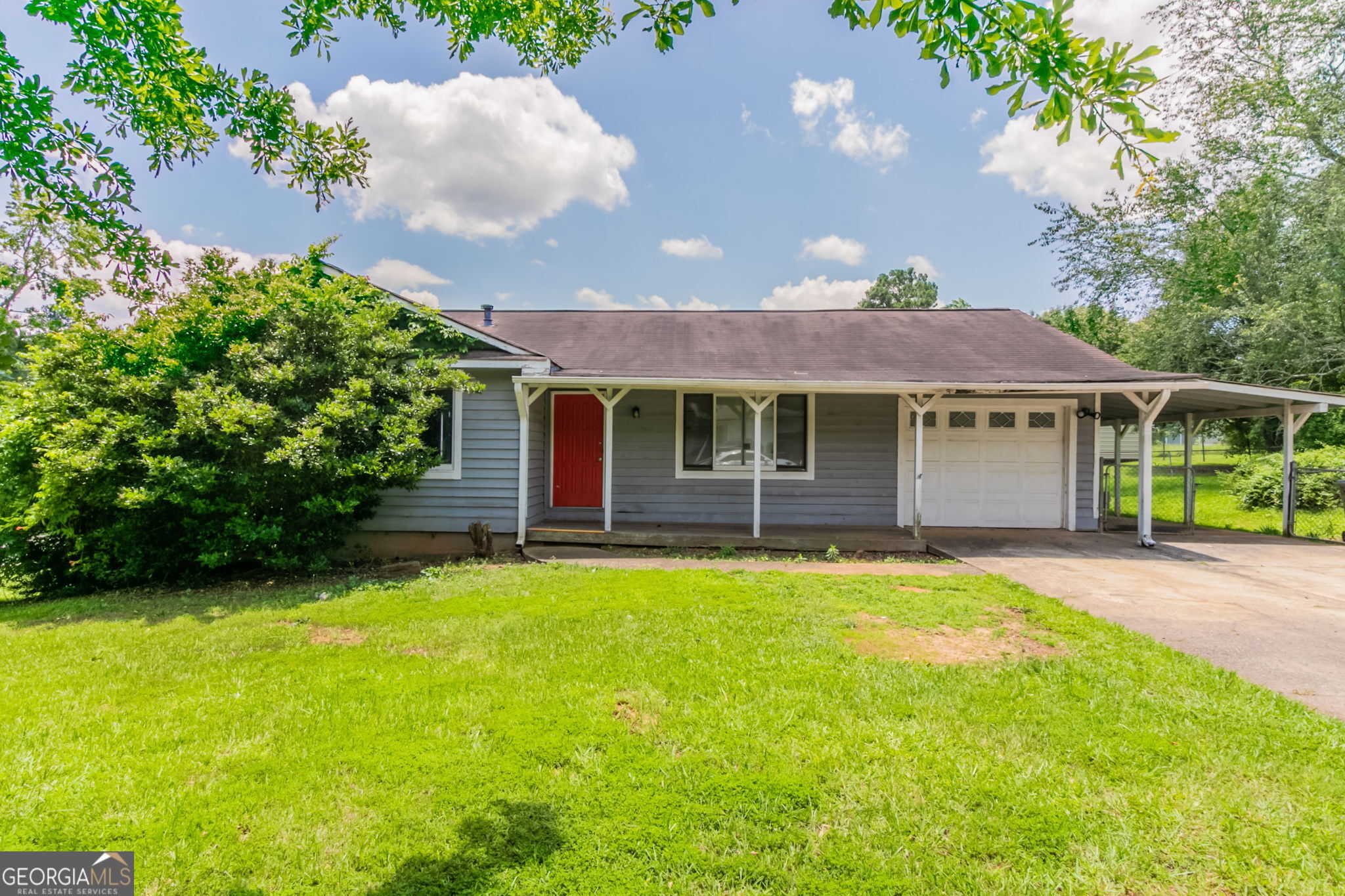 Welcome to this charming split-level home tucked into a peaceful residential community in Rex. The layout offers flexible living with a bright main level, spacious family room, and well-sized bedrooms ideal for both privacy and comfort. A lower-level bonus area provides extra room for entertaining, a home office, or workout space. The backyard is private and tree-lined-perfect for outdoor gatherings or quiet relaxation. Whether you're a first-time buyer or looking for an investment opportunity, this property offers space, potential, and convenience in one package. Located near shopping, dining, and major highways for easy commuting. This home has been virtually staged to illustrate its potential.