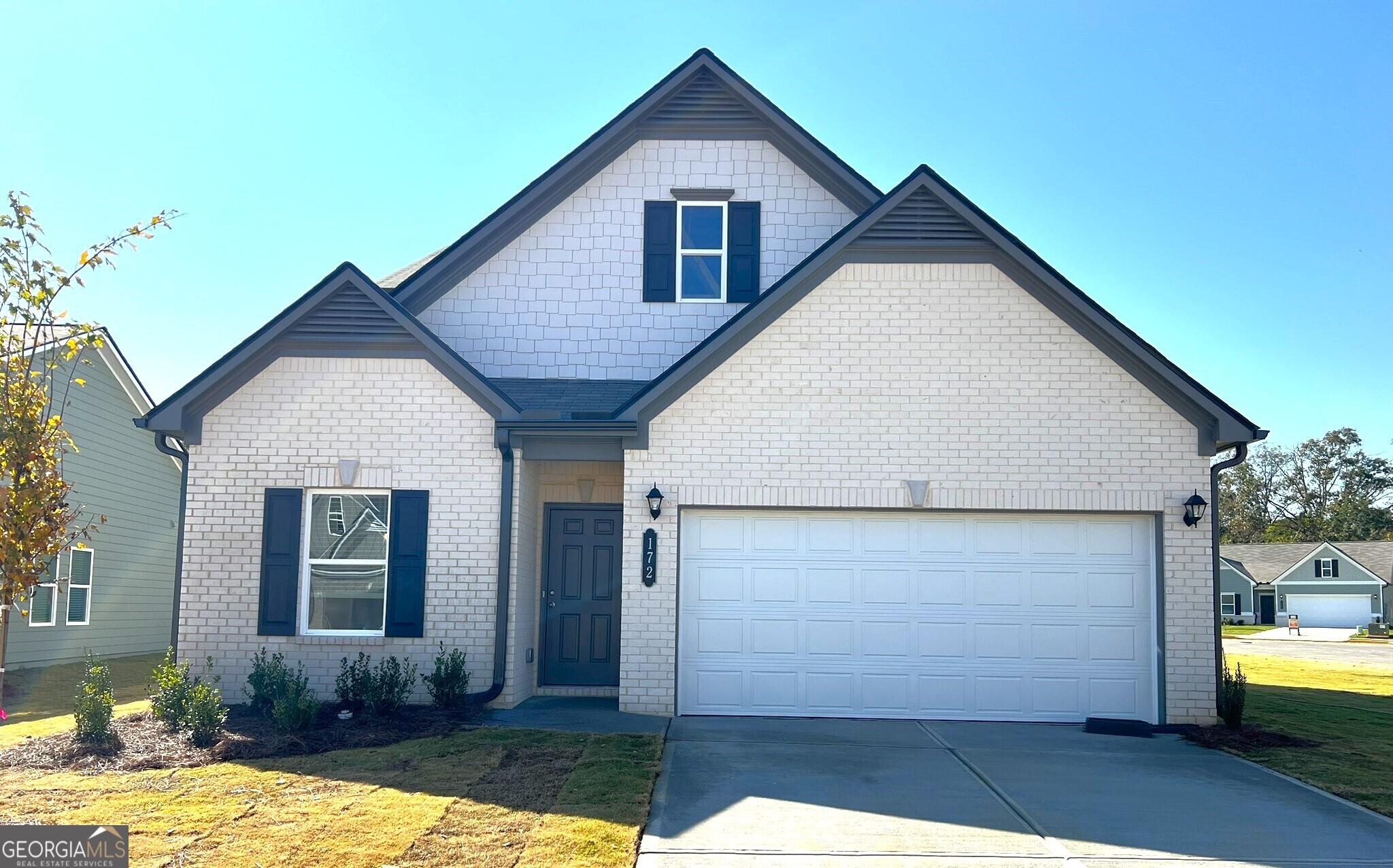 This is your chance to be in the new community Laurel Park by Smith Douglas community! Master on the main in this 4-bedroom, 2.5-bathroom single-family home. The main level has kitchen/dinning/living room with 1 master room and has LVP flooring, while the three bedrooms upstairs are comfortably carpeted. The kitchen uses white cabinetry, granite countertops, pantries and connects to a separate dinning room and an opening living area. The master bedroom is on the main floor includes a generous walk-in closet and a master bathroom with tub/shower combination. The three bedrooms upstairs have big walk-in closets for each room sharing with a full guest bathroom. The exterior includes a two-car garage and an covered back patio. Only 15 minutes from Q-cells and S-JV Battery. Downtown Atlanta is just 45 minute drive away. Nearby amenities include Walmart, Home Depot, Piedmont Hospital, all within a short drive, providing convenient shopping and healthcare options.