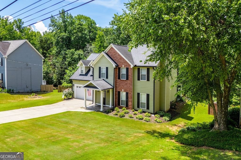 Photo of 955 Pointers Way, Lawrenceville, GA 30043 (MLS # 10652327)