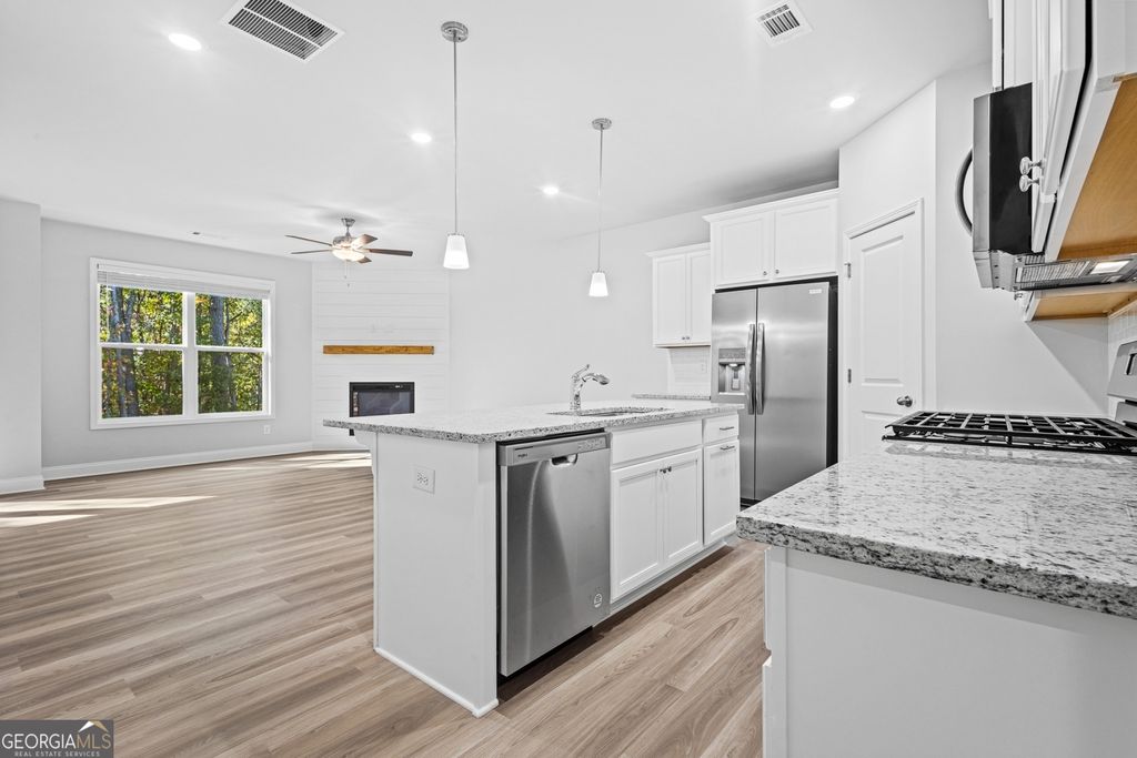 Photo of 1593 Gin Blossom Circle, Lawrenceville, GA 30045 (MLS # 10807534)
