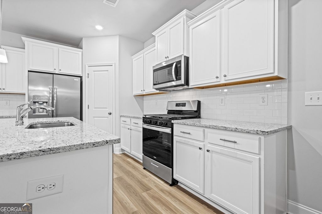 Photo of 1593 Gin Blossom Circle, Lawrenceville, GA 30045 (MLS # 10807534)