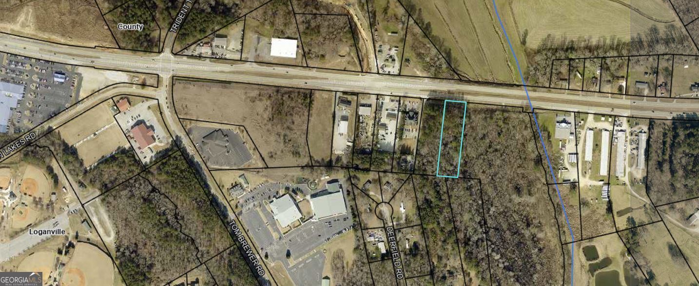 Key Features: TWO Parcel Land 1. Excellent Location: Located in Loganville, this property benefits from high visibility and significant daily vehicular traffic. Its proximity to schools, shopping, and community amenities positions it as a prime site for development. 2. Two Parcels Sold Together: Together, Parcel C0430014 and Parcel C0430015 total approximately 3.6 acres of premium land with the advantage of a 300-foot road frontage. The combined size offers incredible opportunities for large-scale projects or subdivided developments. 3. Development Potential: Currently zoned for Manufactured Housing (MH), this property is a prime candidate for rezoning to commercial. Its location and dimensions make it ideal for retail centers, office buildings, or mixed-use developments. 4. High Traffic Count: Positioned along HWY 78, the property sees an average daily traffic count of 25,000 vehicles, ensuring a steady stream of exposure for any future business or development.