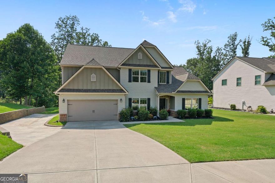 Welcome to 31 Thunderhawk Lane, a well-appointed home nestled in a peaceful neighborhood in Rydal, GA. Situated on a .78-acre lot, this four-bedroom, three-and-a-half-bath home offers over 3,000 square feet of practical living space, perfectly suited for the season ahead.    Inside, the main floor features an open-concept layout with a spacious living room anchored by a stone fireplace-ideal for crisp fall mornings. Tall windows bring in soft, natural light while vaulted ceilings create a sense of openness. The kitchen is equipped with granite countertops, stainless steel appliances, and a central island, with a casual dining nook overlooking the changing colors of the backyard.    The main-level suite includes a generous walk-in closet and a private bath with dual vanities, a soaking tub, and a separate shower. Also on the main floor are a half bath, laundry room, and access to the two-car garage, all designed for ease of use.    Upstairs, you'll find three additional bedrooms and two full bathrooms. One bedroom features its own private ensuite, offering flexibility for guests or live-in arrangements. The loft provides bonus space that works well as a reading nook, office, or playroom.    Step outside to enjoy the covered patio with a ceiling fan-perfect for fall afternoons or weekend gatherings. The backyard is wide open and ready for whatever plans you have next, whether it's outdoor dining, games, or simply enjoying the fresh air.    Located just minutes from Cartersville and I-75, 31 Thunderhawk Lane offers the quiet of Rydal with convenient access to shops, schools, and commuter routes. If you're looking for space, function, and seasonal comfort, this home is ready for your tour. Schedule a showing today.