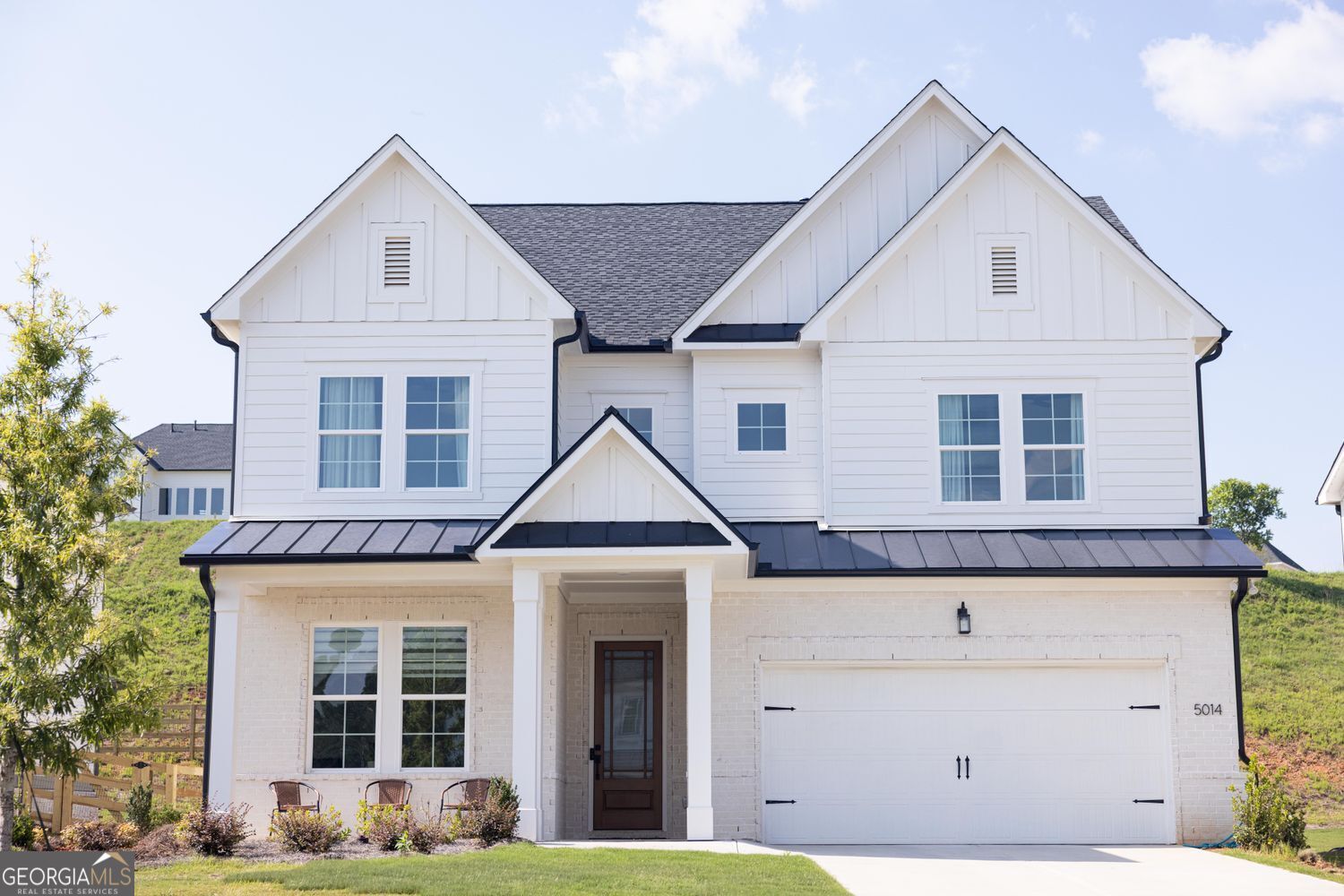 Welcome to 5014 Baywood Lane, a luxurious newconstruction home nestled in the Holly Farm community of Woodstock, GA. This pristine 5-bedroom, 4 bath residence offers approximately 3,310 sqft of thoughtfully designed living space on a level 9,583 sqft lot. This is a Rare Opportunity to rent a Brand-New Toll Brothers Masterpiece with Stunning Lake Views, perfectly situated in the Prestigious Holly Farms Community. This White Modern Farmhouse offers an Unparalleled Blend of Sophistication, Luxury, and Comfort, nestled between Woodstock and Milton. The openplan layout flows seamlessly into a gourmet kitchen equipped with quartz counters, a large island, walkin pantry, and KitchenAid appliances alongside a 5burner gas cooktop; plus an office and guest suite and full bath. Retreat to a spacious primary suite featuring tray ceilings, oversized walkin closet, and an ensuite bath with dual vanities and oversized shower. Three additional bedrooms (one ensuite), a large loft, and an upperlevel laundry room complete this floor. Life at Holly Farms offers more than just a home, enjoy peaceful strolls by the Scenic Lake, an Inviting Resort-Style Pool and Cabana, Pickleball Courts, and an Unmatched Community Atmosphere, all within Top-Rated School Districts and just minutes from Downtown Alpharetta, Halcyon, Crabapple, Avalon, Canton Street, Premier Golf Courses, and an endless array of Shops, Dining, and Lifestyle Amenities. This is not just a home it is an Exceptional Lifestyle Waiting for You.