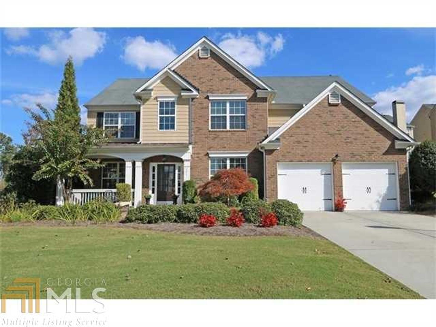 Beautiful former Model Home on a Corner Lot. This Home has it ALL!! Kitchen w/Granite Counters, Upgrated SS Appliances, Dark Maple Cabinets. Mudroom - Built-ins in Living/Office and Family Room. Two sided Fireplace. Oversized Master Suite with Closet Organizer!! Master Bath with Jetted Tub. Guest Bedroom on Main with Full Bath! Hardwoods throughtout the Main. Upgrated Tile Work in All Baths. Irrigation System! Way To Much To List. Will Not Last Long!!! A MUST SEE!!!