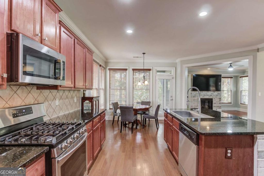 Photo of 588 Myrtle Trace Lane, Suwanee, GA 30024 (MLS # 10630529)