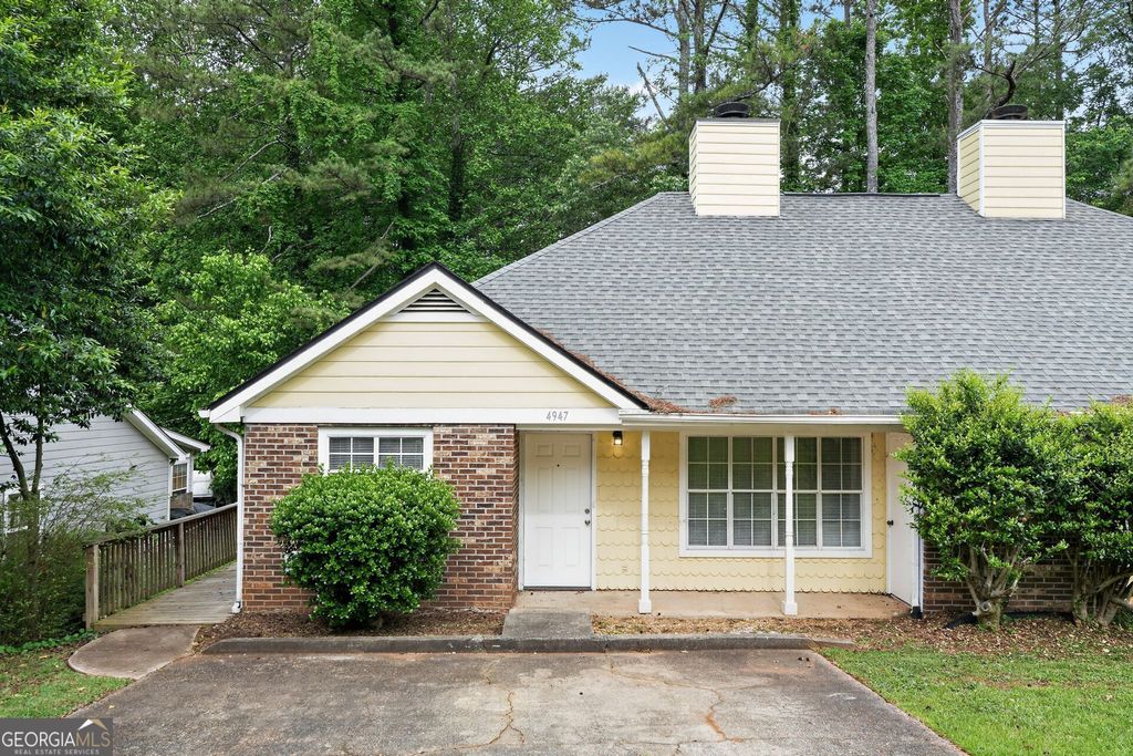 Photo of 4947 Farmstead Court NE, Woodstock, GA 30188 (MLS # 10758426)