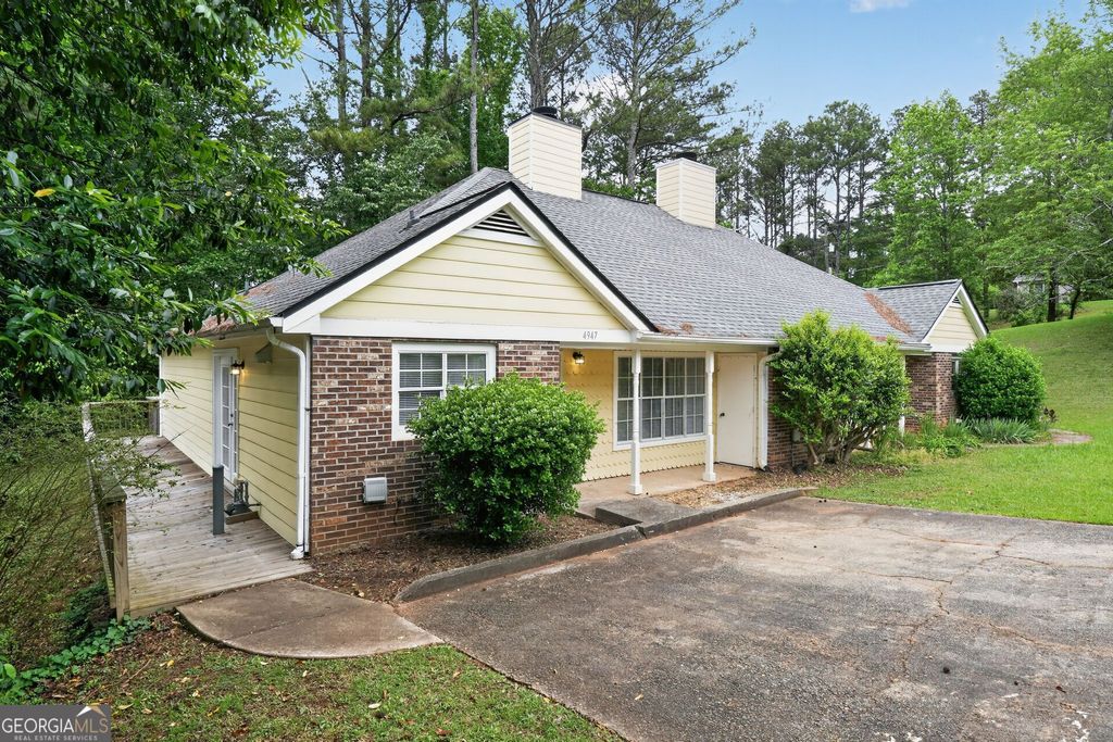 Photo of 4947 Farmstead Court NE, Woodstock, GA 30188 (MLS # 10758426)