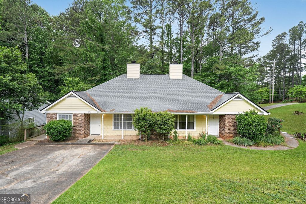 Photo of 4947 Farmstead Court NE, Woodstock, GA 30188 (MLS # 10758426)