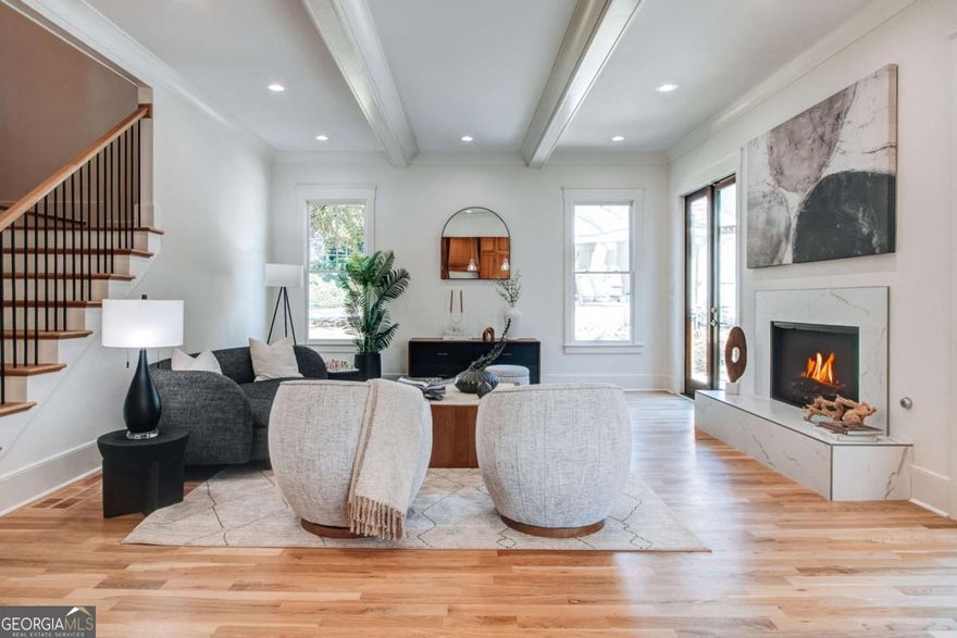 Exquisite Custom-Built Masterpiece in the Heart of Morningside - Now Offered at $1.95M    With a motivated seller and the opportunity to secure your 2025 Homestead Exemption by closing before 12/31/25, this is the moment to make Morningside's newest masterpiece your own-where modern elegance meets timeless charm.  Experience the pinnacle of modern luxury and exceptional craftsmanship in this newly constructed, custom-designed estate, ideally positioned in the highly coveted Morningside neighborhood. Designed for those who appreciate architectural intention and timeless elegance, this 7-bedroom, 5.5-bath masterpiece offers an extraordinary blend of sophistication, functionality, and everyday comfort.    Before you even step inside, you're welcomed by a charming, spacious front porch-an inviting place for a swing or classic rocking chairs, perfect for enjoying the warmth and character of this beloved community.    Inside, a thoughtfully curated floor plan unfolds with effortless flow. To the left, a main-level guest suite with a private en-suite bath provides versatility for guests, multigenerational living, or a dedicated home office. To the right, a sleek powder room and elegant formal dining room set the stage for refined entertaining and memorable gatherings.    At the heart of the home lies a truly showstopping chef's kitchen, featuring custom white oak cabinetry, striking quartz countertops and backsplash, a large center island, and a premium appliance package, including an 8-burner gas range and wall-mounted pot filler. A walk-in pantry and a dedicated serving area with additional cabinetry and a prep sink make hosting effortless and elegant. The kitchen flows seamlessly into the bright, sunlit family room, anchored by a dramatic fireplace and framed by two sets of double doors leading to a private deck-ideal for indoor-outdoor living year-round.    Upstairs, retreat to the luxurious owner's suite, a true sanctuary showcasing gleaming hardwood floors, an oversized custom walk-in closet, and a spa-inspired ensuite bath designed to rejuvenate. A freestanding soaking tub, glass-enclosed shower, and dual vanities with generous storage complete the experience. This level also offers three additional bedrooms, two full bathrooms, and a large laundry room equipped with built-in cabinetry and a utility sink.    The fully finished terrace level expands your lifestyle options with a media room, two additional bedrooms, and a shared full bath-perfect for a home gym, yoga studio, playroom, guest retreat, or creative workspace.    Additional highlights include a 2-car garage with high ceilings, located conveniently on the left side of the home, complete with an EV charging connection, plus an extended driveway offering abundant parking. Professionally landscaped grounds enhance the overall curb appeal and complete the polished exterior.    Situated in one of Atlanta's most treasured neighborhoods, this home offers unmatched access to Piedmont Park, the Atlanta Botanical Garden, the BeltLine, Midtown, and Virginia-Highland. Even more exciting, it provides a direct line to the upcoming entrance of the planned Piedmont Park expansion located just around the corner, promising exceptional long-term value and one of the most sought-after amenities in the city. With quick access to I-85 and GA-400 and zoning for top-rated Morningside Elementary, everyday convenience is simply unparalleled.      Schedule your private tour today before this one-of-a-kind home is gone.  Offers must be submitted through Propoffers website. An offer management fee of $200 (plus tax where  applicable) is charged by Pyramid Platform in connection with the use of Propoffers. This fee will be paid at closing from the agent  representing the buyer as selling agent or transaction broker. - Subject to seller addendum