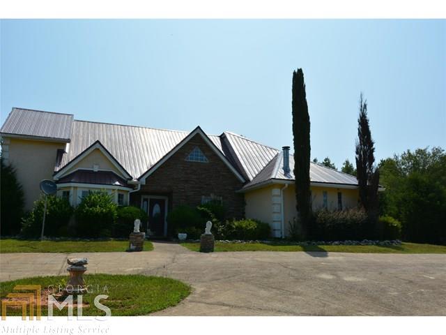 Sold As Is, No Disclosure. Separate Living Room and Dining Room, Kitchen with Eat in Area open to patio and Pool. Formal Living Room and Dining Room, Den/Family Room, Master located on the Main Floor, Garage Converted into additional Family Room, 3 Bedrooms Upstairs, one with private Bath. A little TLC can make this home into a showpiece. Partially fenced, ready to for horses. This home is for the savvy Buyer! Don't miss out on this deal!