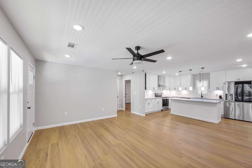 Photo of 1063 Chapman Lane, Stone Mountain, GA 30088 (MLS # 10724364)