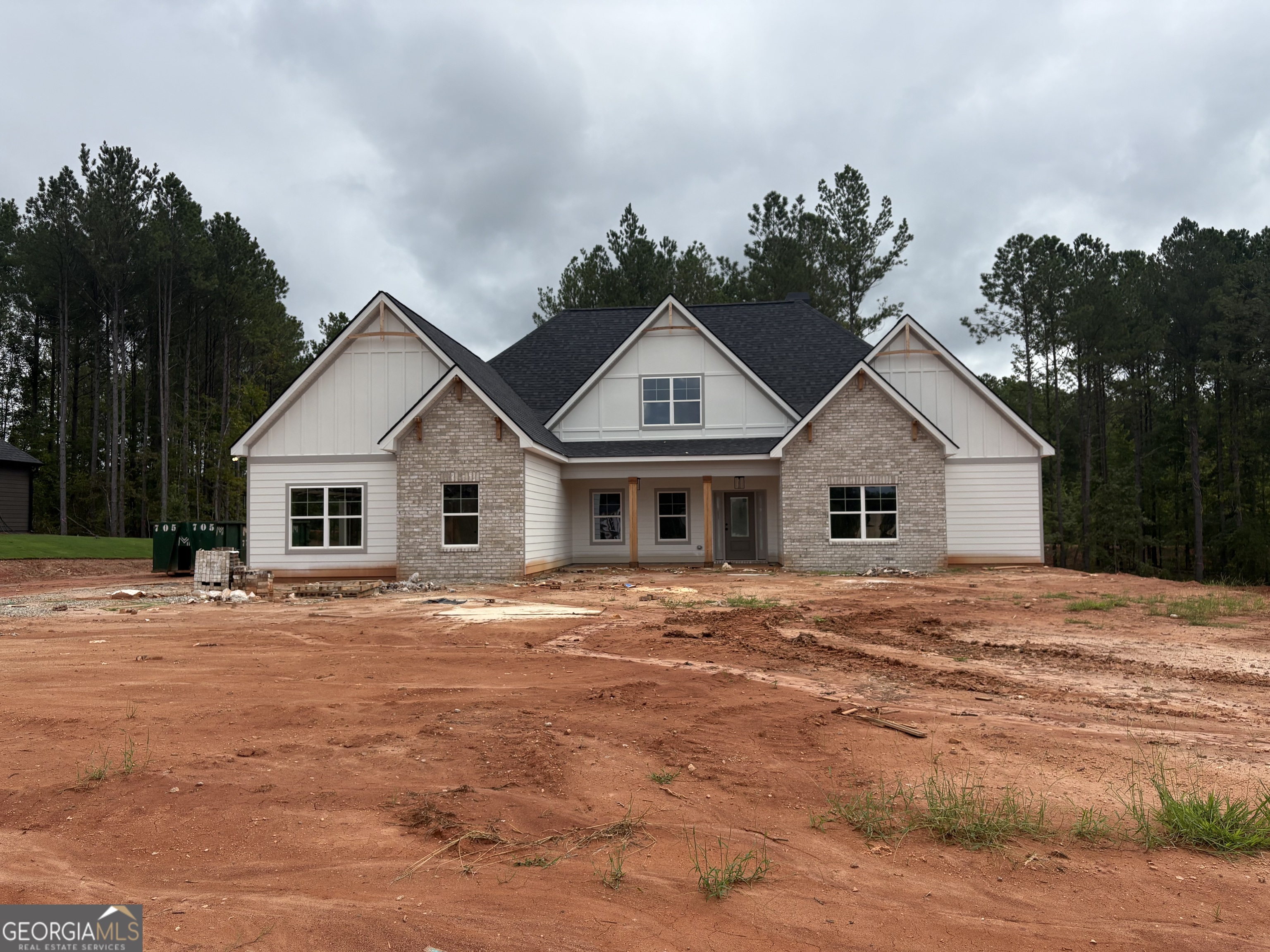 Greywell F Love to cook and entertain? The Greywell plan has exactly what you're looking for! This 3600+ sq. ft. 5 bedroom, 3.5 bath plan has not one, but TWO islands in the oversize kitchen! Granite, Quartz or Marble countertops, stainless steel appliances. This open floor plan overlooks the breakfast, keeping room, and the family room with fireplace. The Greywell is perfect for both large gatherings or quiet, cozy evenings at home. The main level houses a formal dining room, secondary bedroom with en suite and laundry room. The oversize Owner's suite is sure to please with the large walk-in closet and bathroom with a double vanity, large walk-in shower and free standing tub. Upstairs you will enjoy 3 spacious bedrooms and 2 full baths off a central landing. This home comes with a 3 car garage and a covered patio.