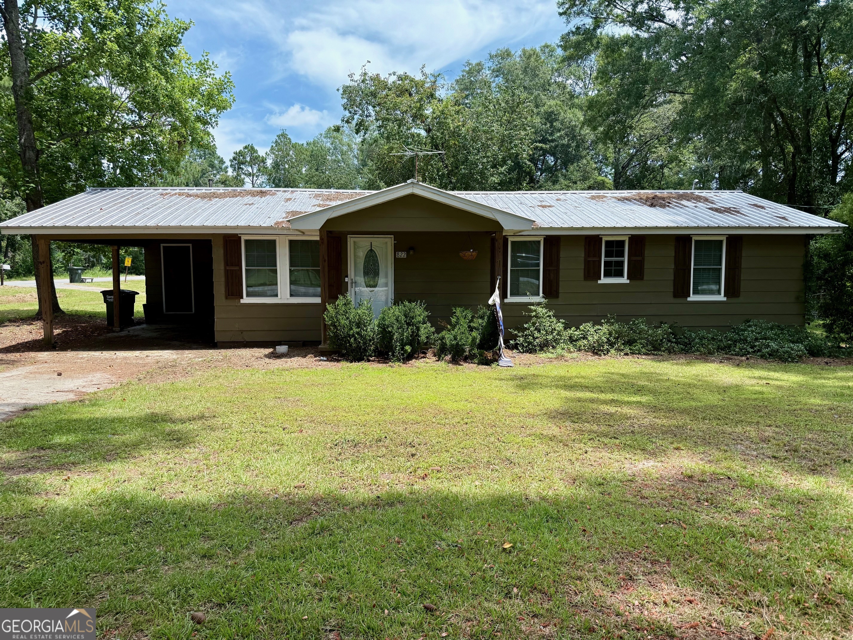 Charming cottage style home with updated kitchen and spacious yard. Welcome to this inviting 3 bedroom 1 full bath 1 half bath ranch style home, nestled on a serene lot with mature trees and plenty of green space! This property combines rustic charm with modern updates perfect for first time buyers, downsizers, or investors.